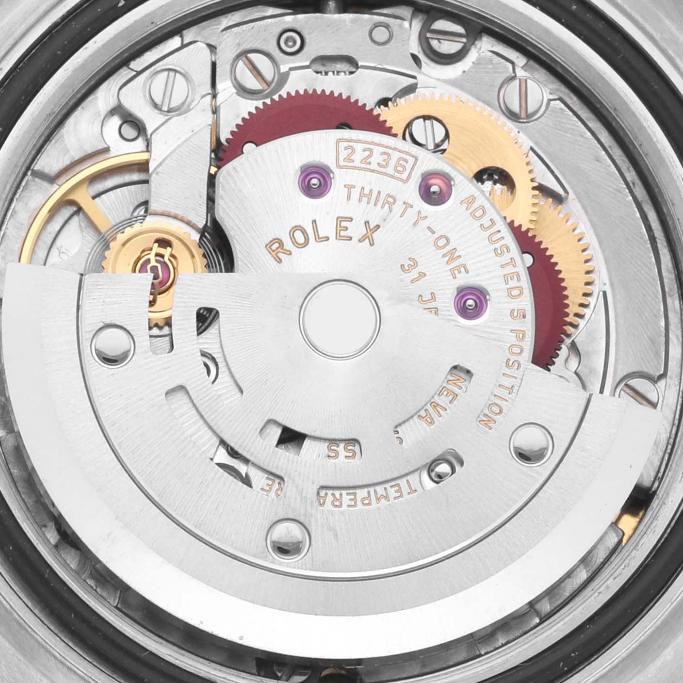The image shows the movement mechanism of a Rolex Datejust 279381RBR Women's Steel and Gold (two tone) Green Dial 279381RBR Women's Steel and Gold (two tone) Green Dial from a top-down angle, highlighting the gears and rotor.