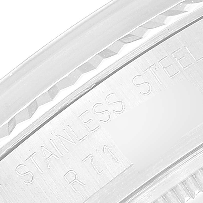 This image shows an up-close view of the engraved back case of a Rolex Vintage Collection 16014 Men
s Stainless Steel Silver Dial 16014 Men
s Stainless Steel Silver Dial watch, highlighting the "Stainless Steel" marker.