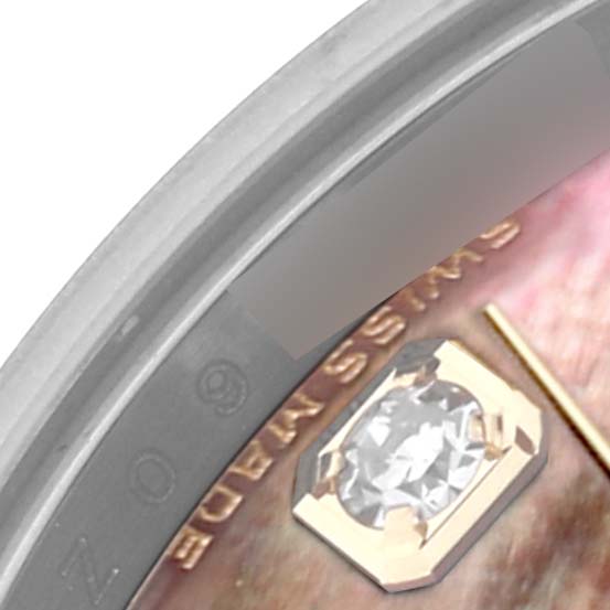 The image shows a close-up of a diamond marker and partial bezel of the Rolex Datejust 179163 Women's Steel and Gold (two tone) Mother of Pearl Dial 179163 Women's Steel and Gold (two tone) Mother of Pearl Dial watch.