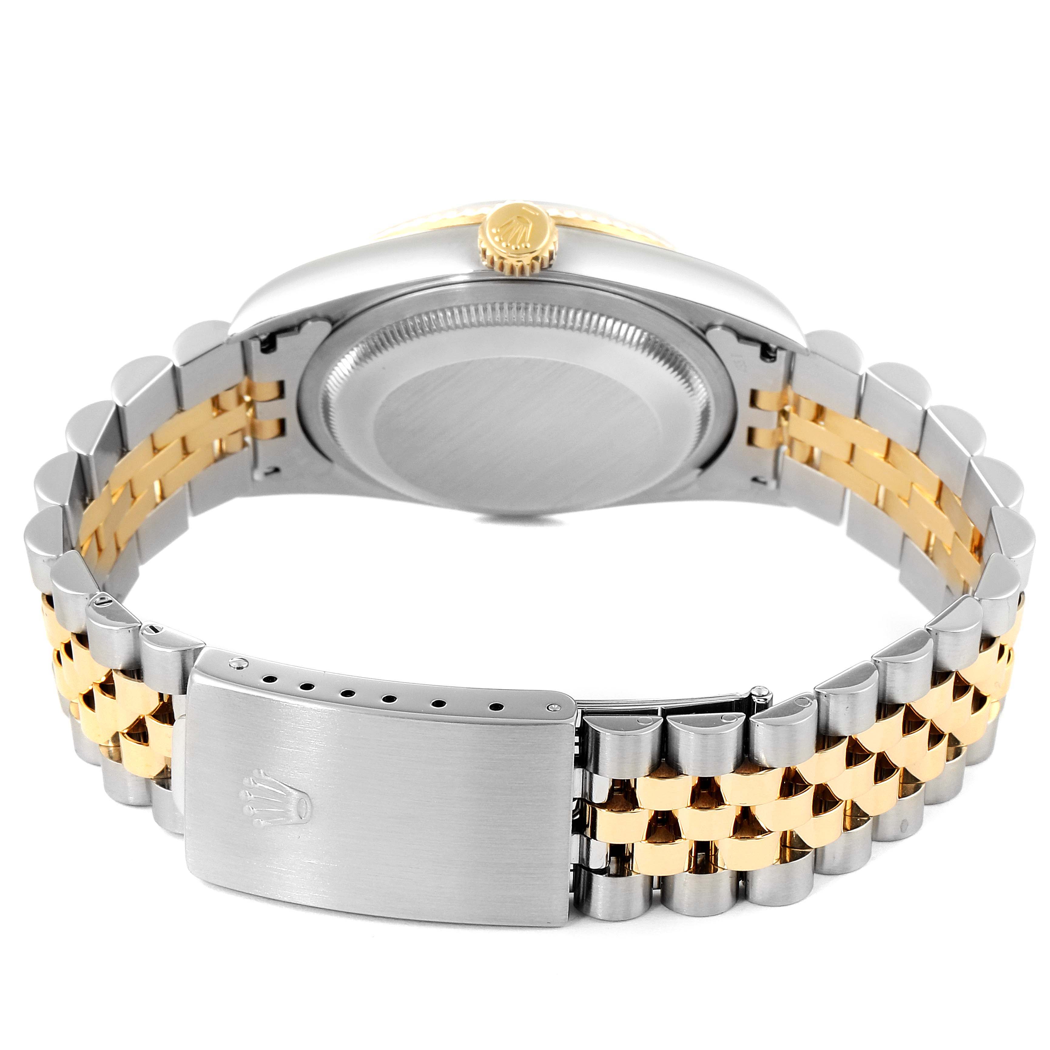 The image shows the back case, crown, and two-tone bracelet of the Rolex Datejust 16233 Men's Steel and Gold (two tone) Blue Dial 16233 Men's Steel and Gold (two tone) Blue Dial watch, viewed from the rear angle.