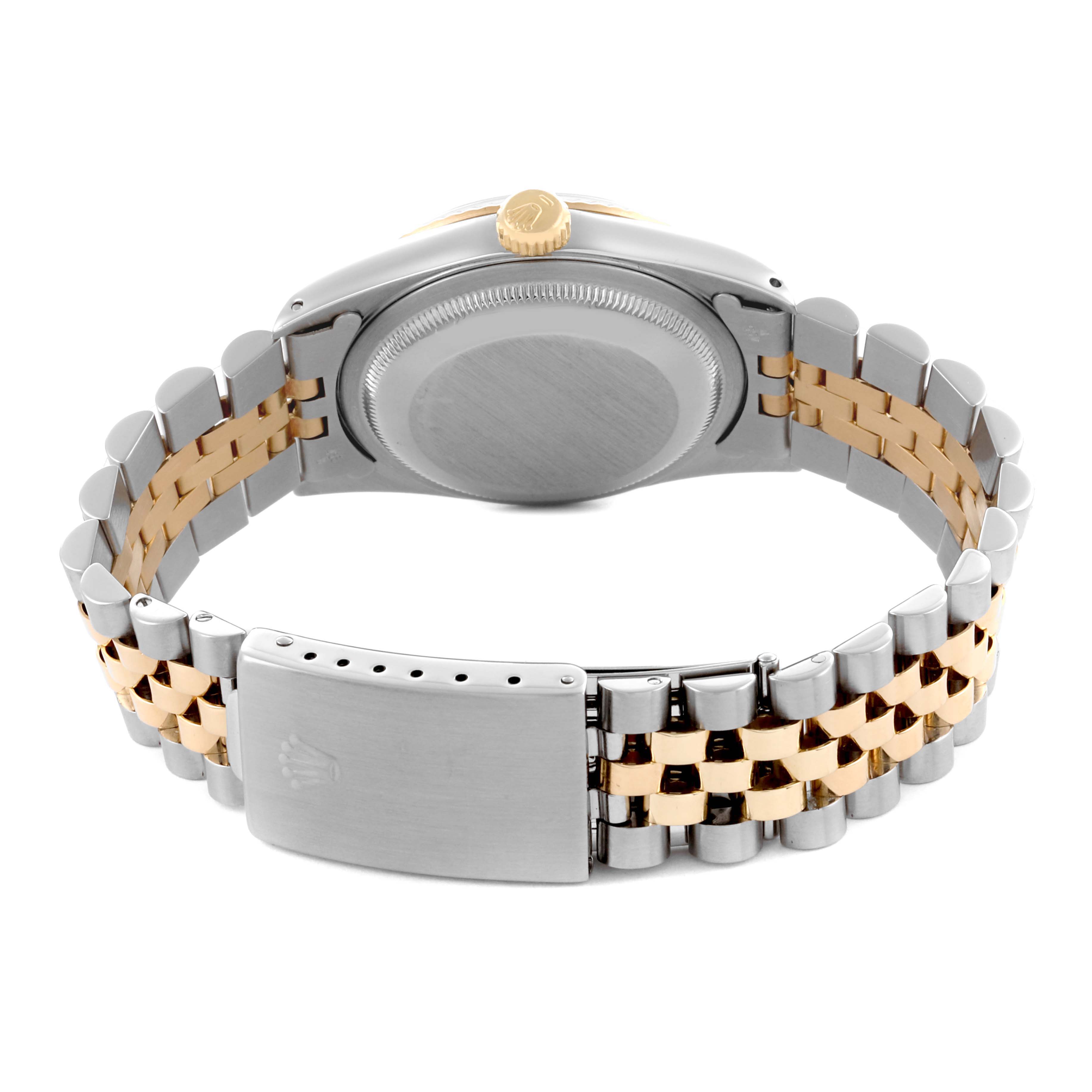 The image shows the back case, crown, and bracelet clasp of a Rolex Datejust 16233 Men's Steel and Gold (two tone) White Dial 16233 Men's Steel and Gold (two tone) White Dial watch, with a two-tone metal strap.