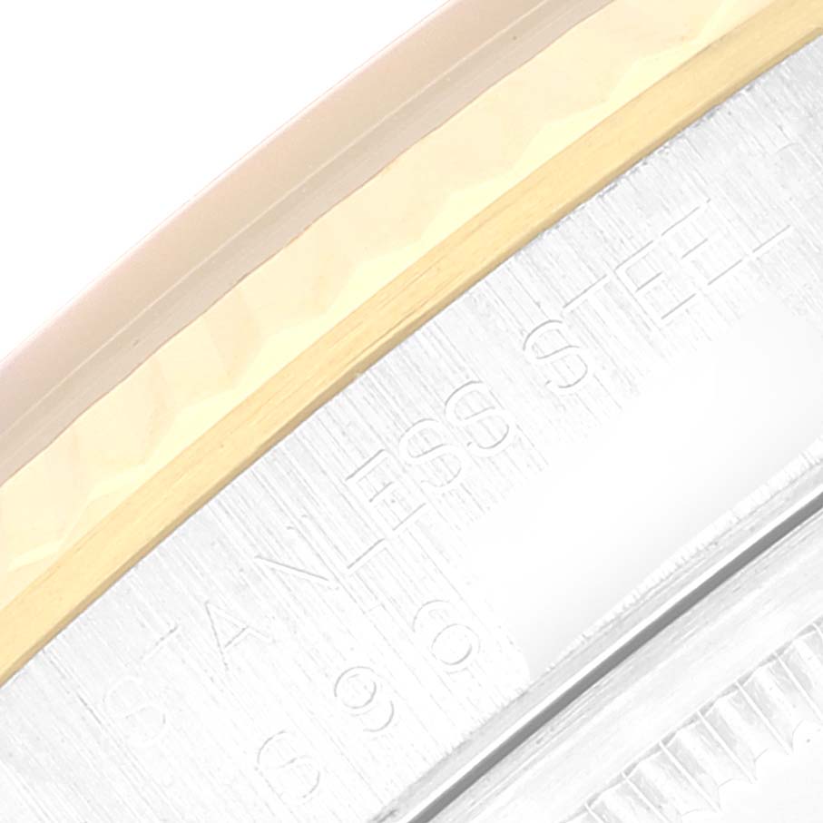 The image shows a close-up of the bezel and case edge of a Rolex Datejust 16233 Men's Steel and Gold (two tone) White Dial 16233 Men's Steel and Gold (two tone) White Dial watch, highlighting the fluted bezel detail.