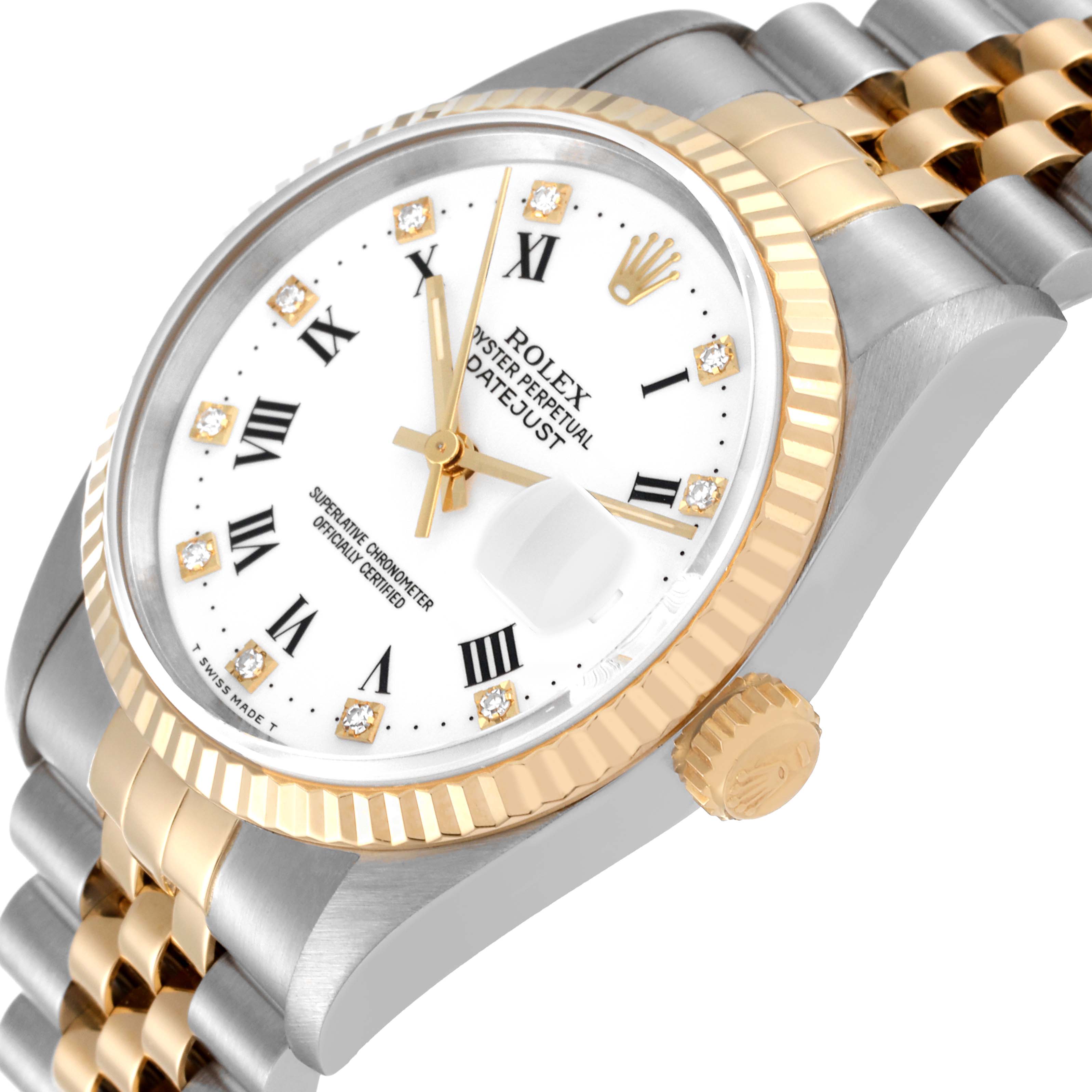 The image shows a close-up view of a Rolex Datejust 16233 Men's Steel and Gold (two tone) White Dial 16233 Men's Steel and Gold (two tone) White Dial watch featuring a two-tone bracelet and fluted bezel.