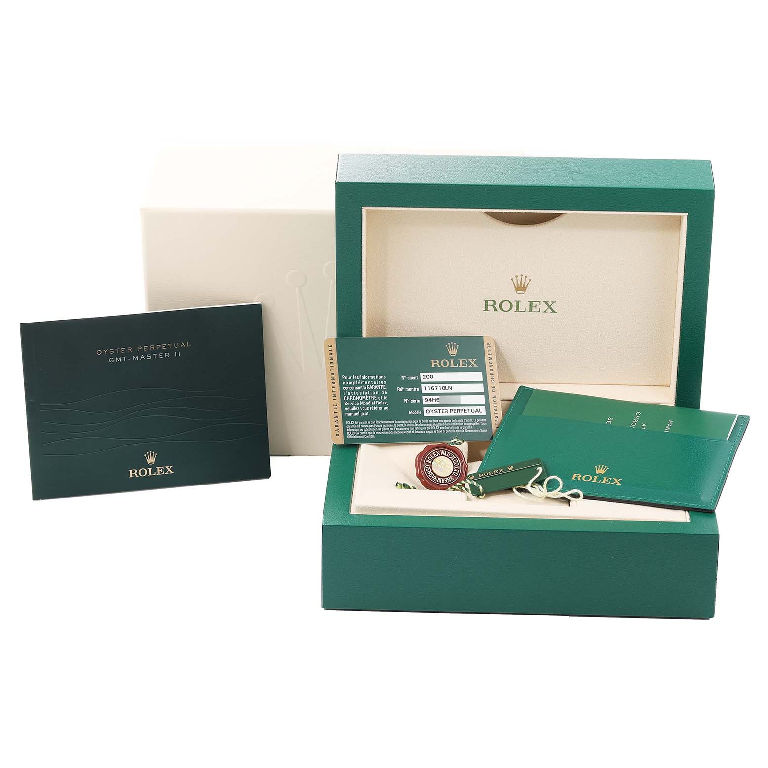 The image shows the watch box, papers, tags, and accessories for a Rolex GMT-Master 116710 Men
s Stainless Steel Black Dial 116710 Men
s Stainless Steel Black Dial model from a front angle.