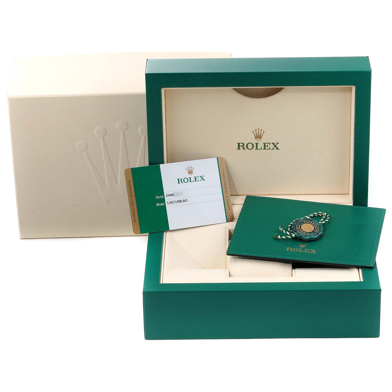 The image shows the box, holder, and card accessories for a Rolex GMT-Master 126710 Men
s Stainless Steel Black Dial 126710 Men
s Stainless Steel Black Dial watch from a front angle.