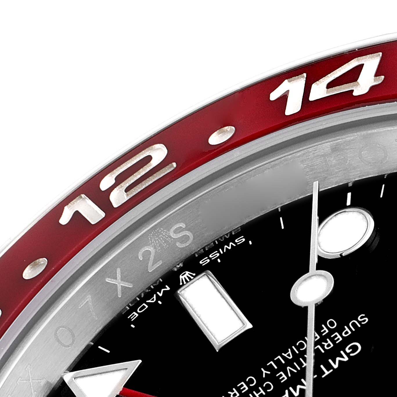 The image shows a close-up of the bezel and part of the dial of a Rolex GMT-Master 126710 Men
s Stainless Steel Black Dial 126710 Men
s Stainless Steel Black Dial watch.