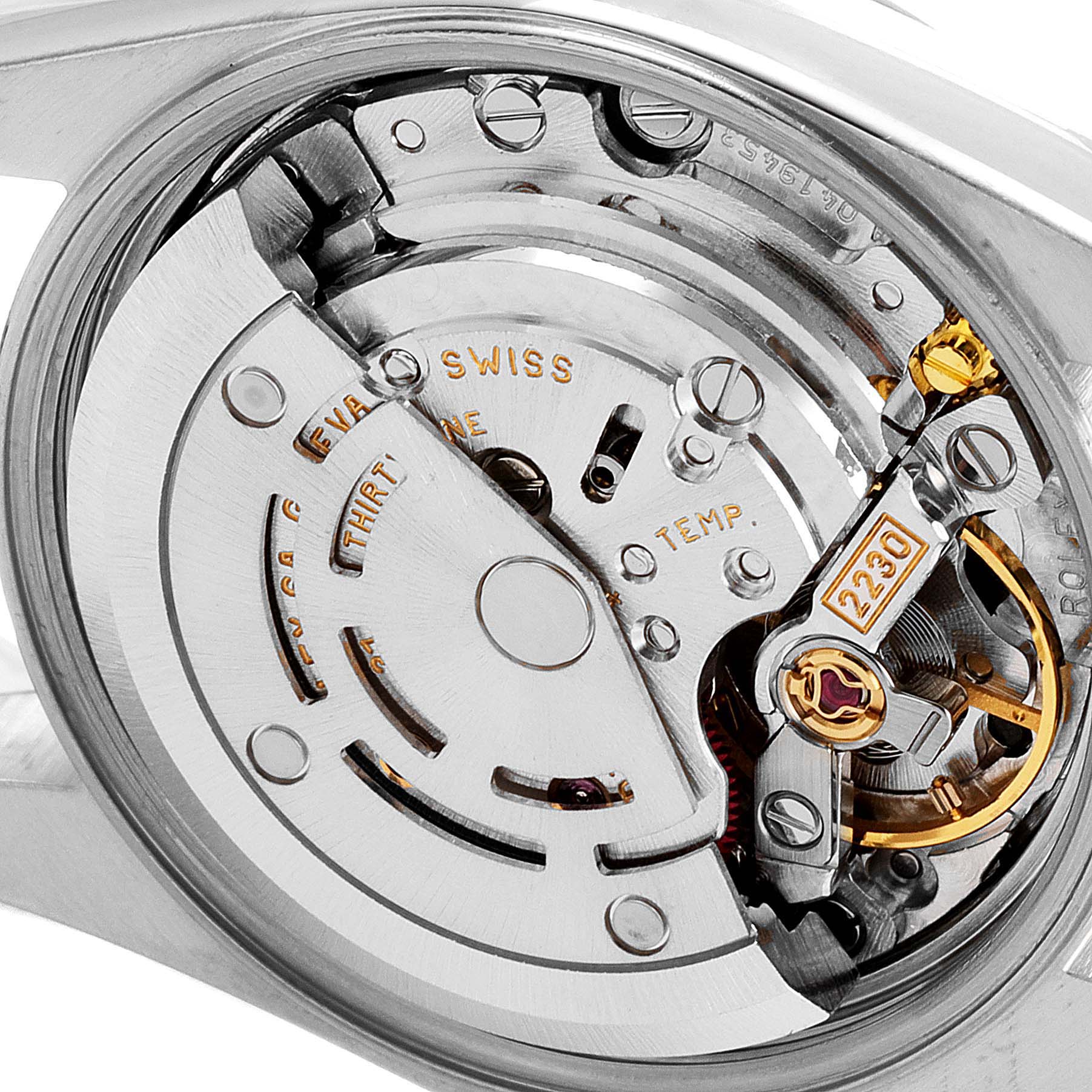 This image shows a close-up view of the movement mechanism of the Rolex Oyster Perpetual 76080 Women's Stainless Steel Black Dial 76080 Women's Stainless Steel Black Dial watch.