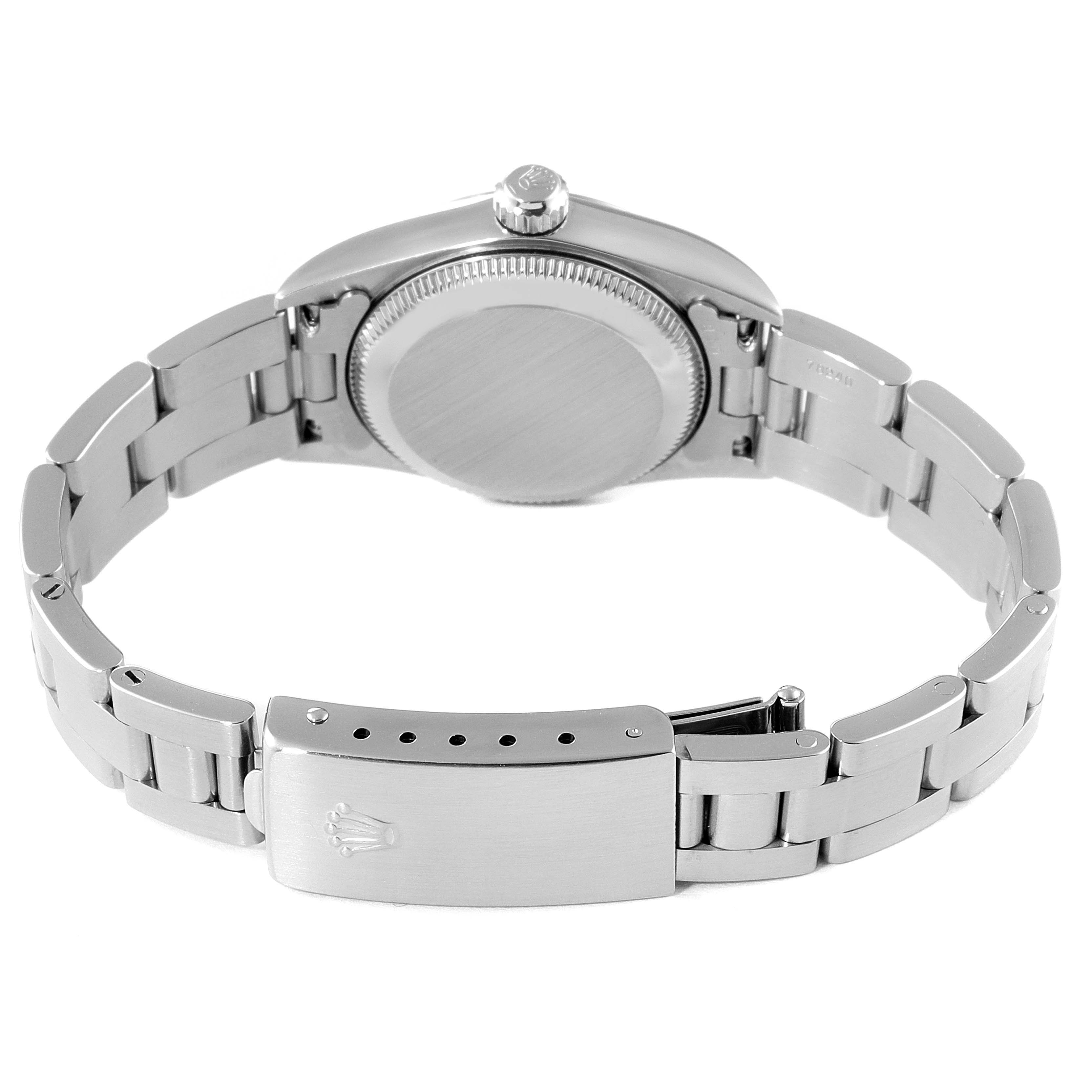 The image shows the back and clasp of a Rolex Oyster Perpetual 76080 Women's Stainless Steel Black Dial 76080 Women's Stainless Steel Black Dial watch, detailing the case back and bracelet.