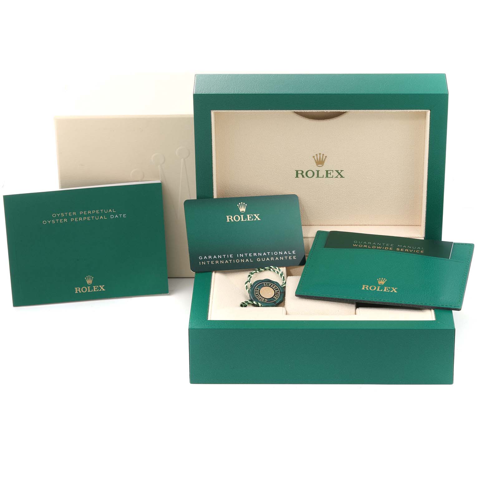 The image shows the Rolex Oyster Perpetual 124300 Men's Stainless Steel Silver Dial 124300 Men's Stainless Steel Silver Dial watch box, manuals, guarantee card, tag, and service booklet.