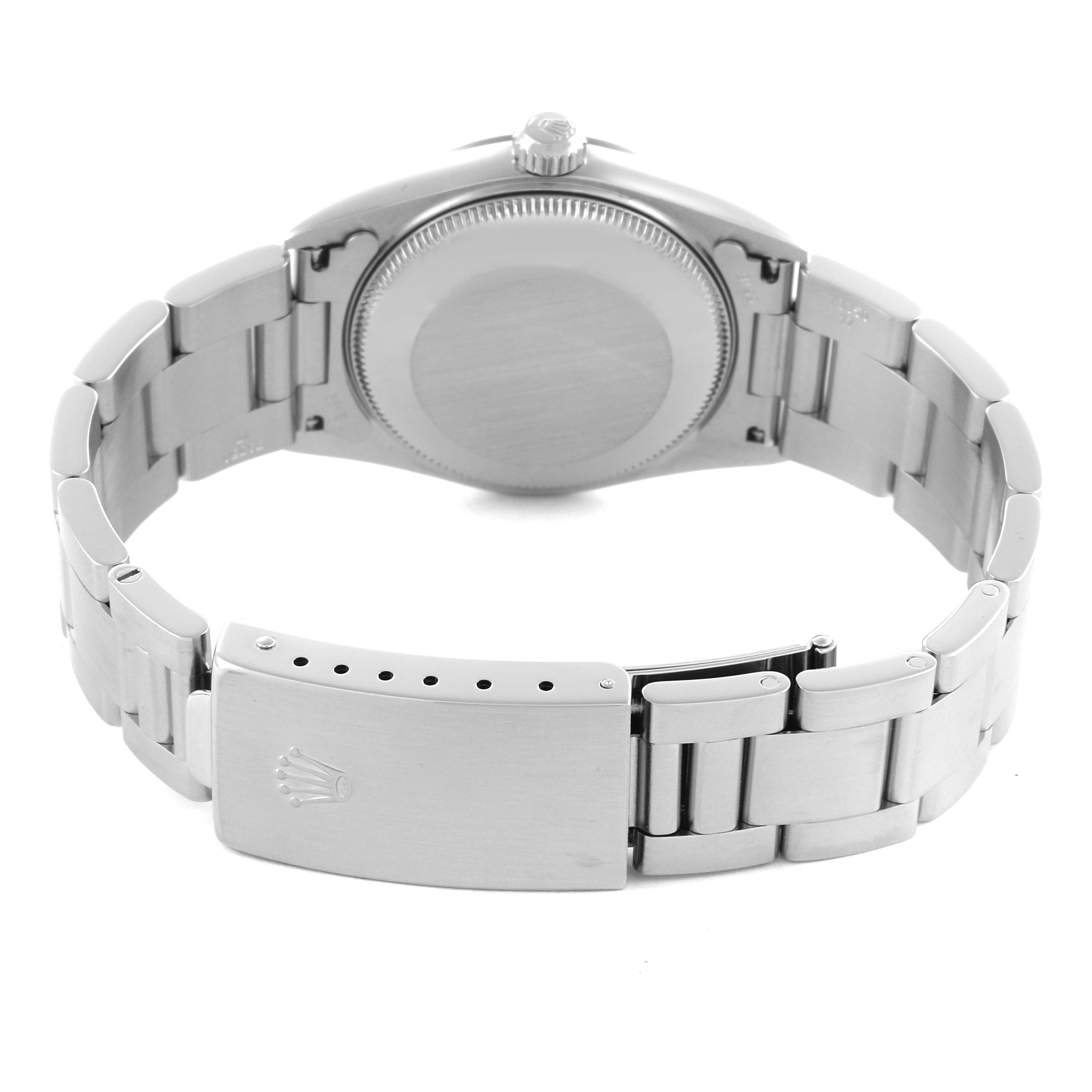 The Rolex Mid-Size 77080 Women's Stainless Steel Pink Dial 77080 Women's Stainless Steel Pink Dial watch is shown from the back, highlighting the case and bracelet clasp.