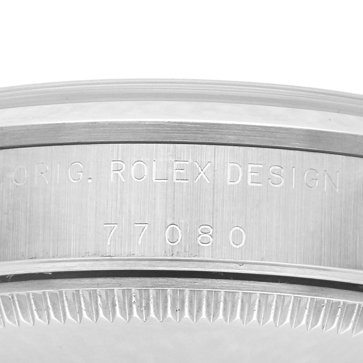 The image shows a close-up of the engraved side casing of a mid-size Rolex model, highlighting "ORIG. ROLEX DESIGN" and the model number "77080."