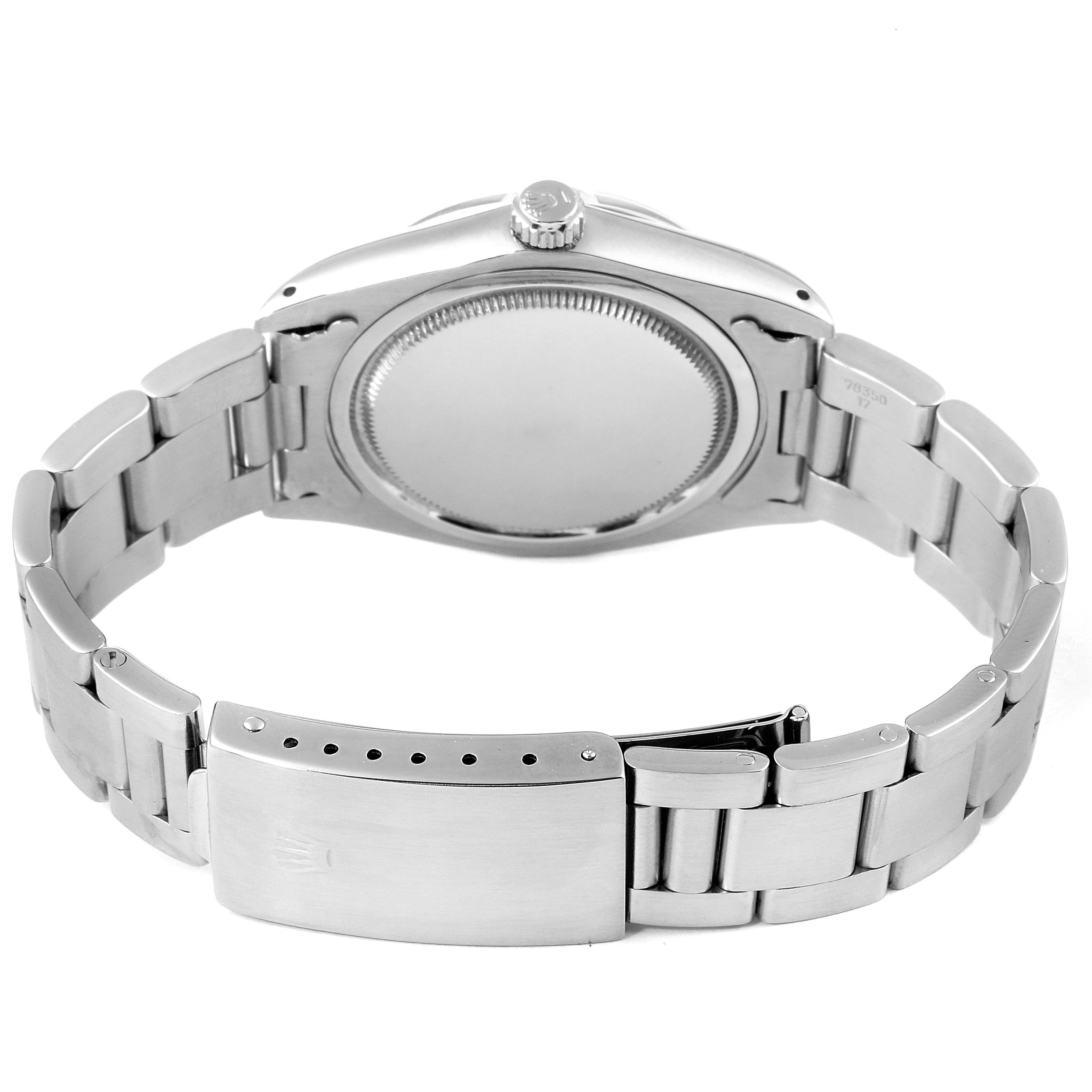 This is a rear view of the Rolex Vintage Collection 6694 Men's Stainless Steel Blue Dial 6694 Men's Stainless Steel Blue Dial watch showing the case back, crown, and stainless steel bracelet.