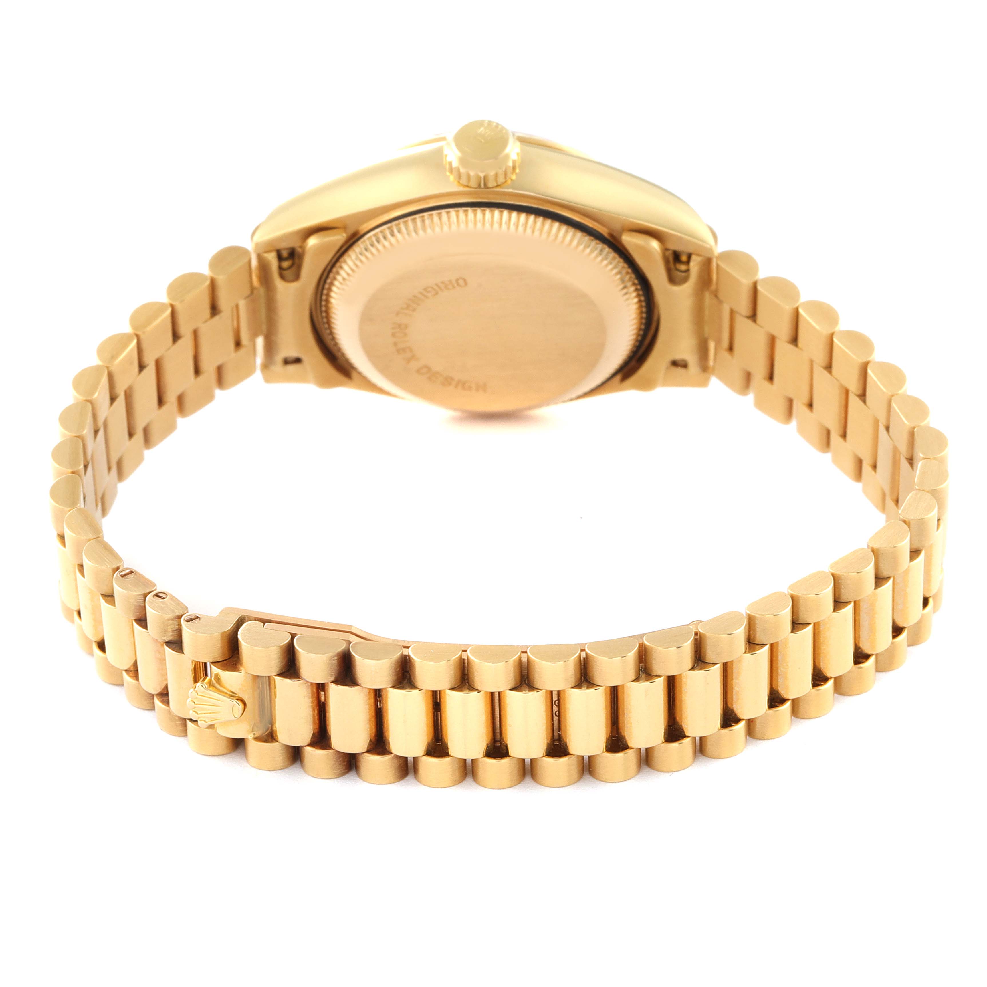 This image shows the Rolex Datejust 69178 Women's Yellow Gold Champagne Dial 69178 Women's Yellow Gold Champagne Dial watch from the back angle, highlighting the case back and gold bracelet.