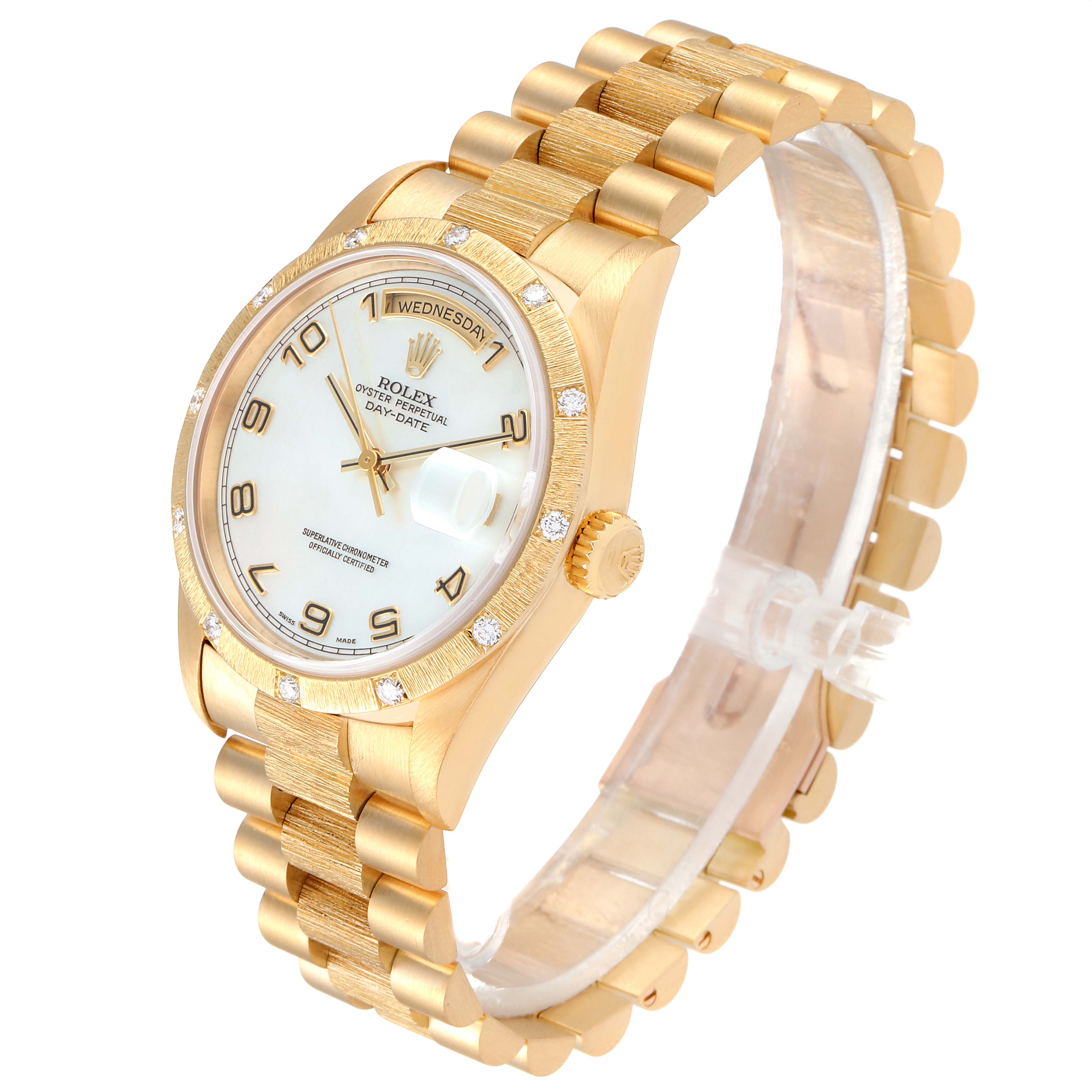 The Rolex President 18308 Men
s Yellow Gold Mother of Pearl Dial 18308 Men
s Yellow Gold Mother of Pearl Dial model watch is shown from a 3/4 angle, displaying its dial, bezel, crown, and bracelet.