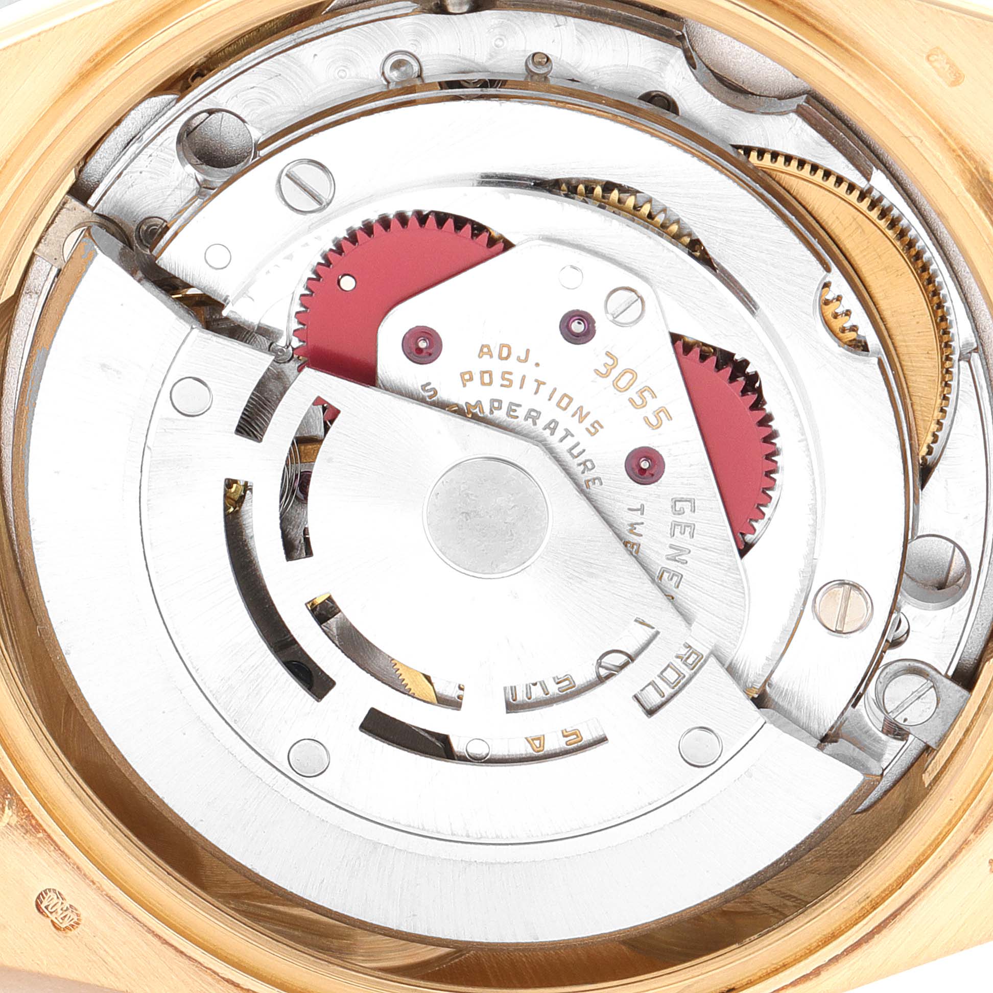 This close-up image shows the movement mechanism inside a Rolex President 18038 Men's Yellow Gold Champagne Dial 18038 Men's Yellow Gold Champagne Dial model watch, highlighting gears and adjustment markings.