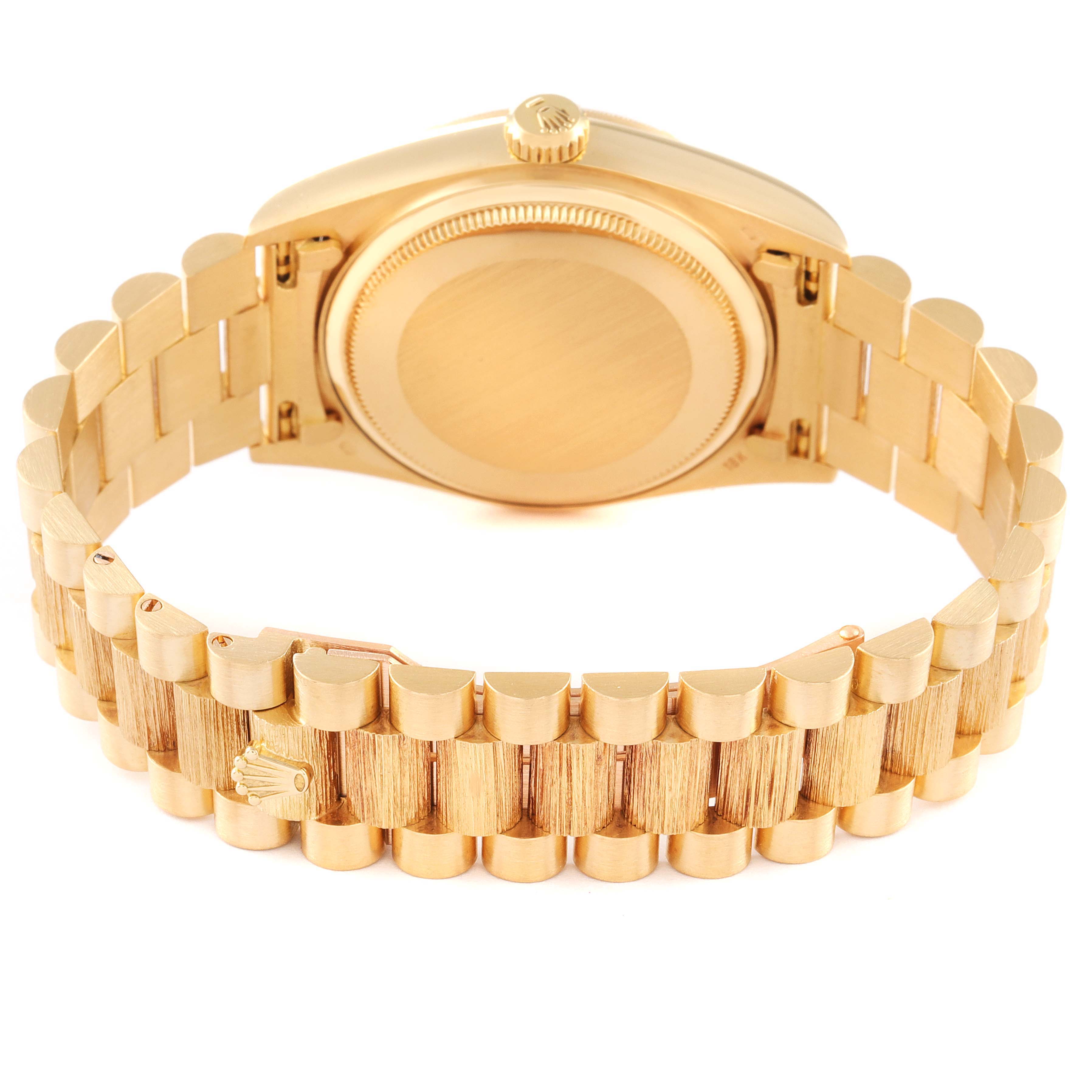 This image shows the rear view of a Rolex President 18078 Men's Yellow Gold Champagne Dial 18078 Men's Yellow Gold Champagne Dial model watch, highlighting its gold bracelet and watch case back.