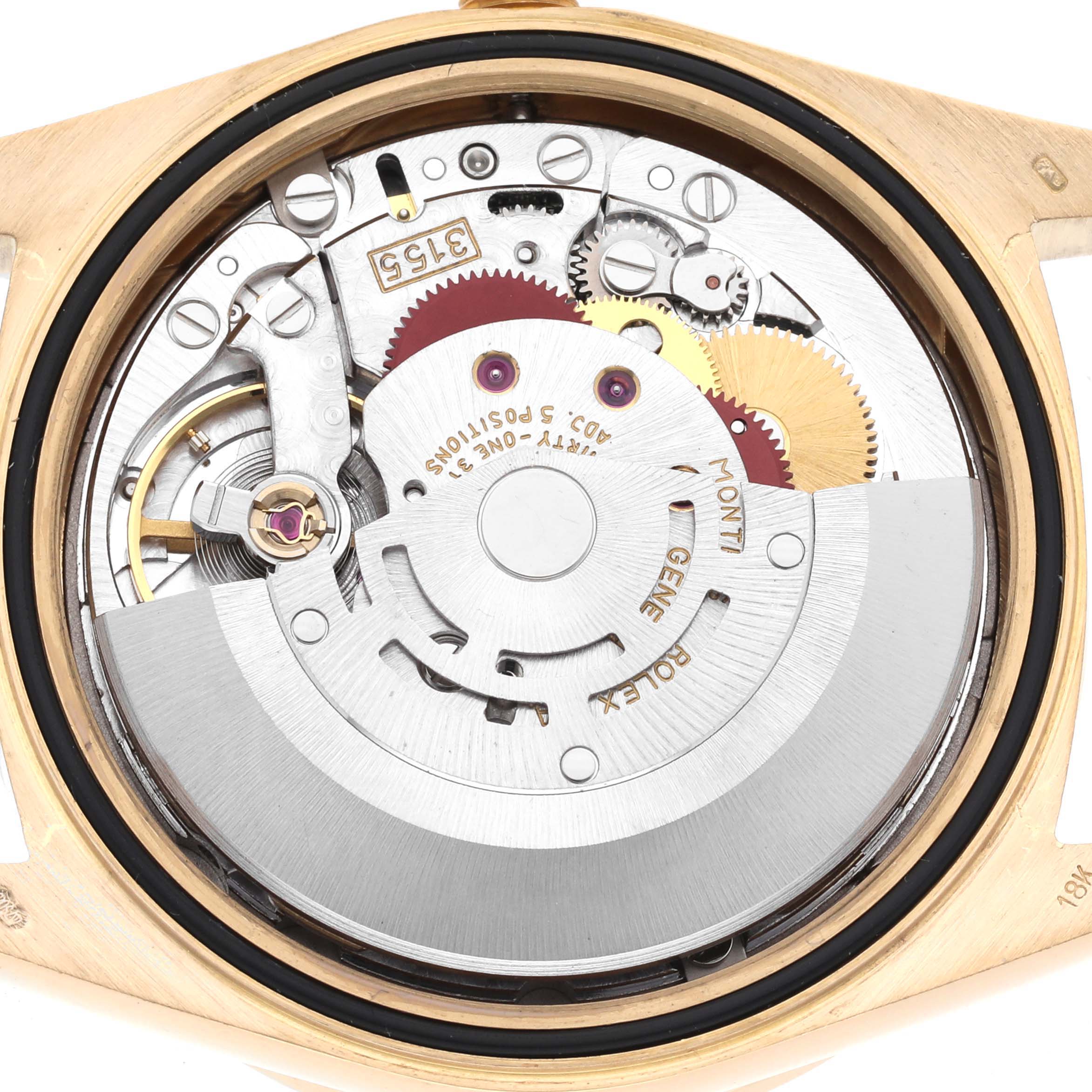 The image shows the Rolex President 18388 Men's Yellow Gold Grey Dial 18388 Men's Yellow Gold Grey Dial model's movement from the back, highlighting its intricate gears and components.