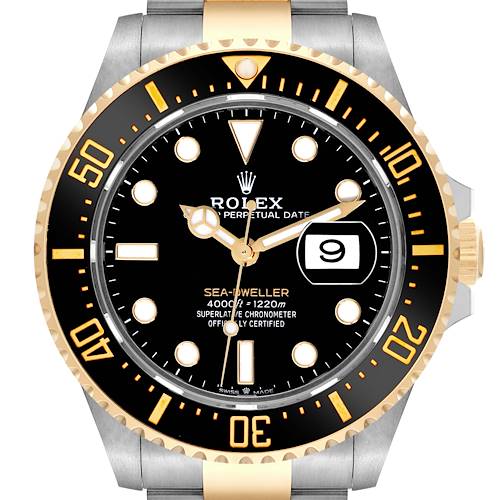 The Rolex Sea-Dweller watch is shown from the front, highlighting its dial, bezel, and part of the bracelet.