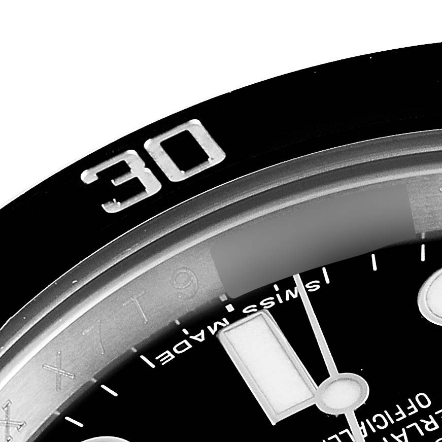 The image shows a close-up of the bezel and part of the dial of a Rolex Submariner 114060 Men
s Stainless Steel Black Dial 114060 Men
s Stainless Steel Black Dial watch, highlighting the number 30 on the bezel.