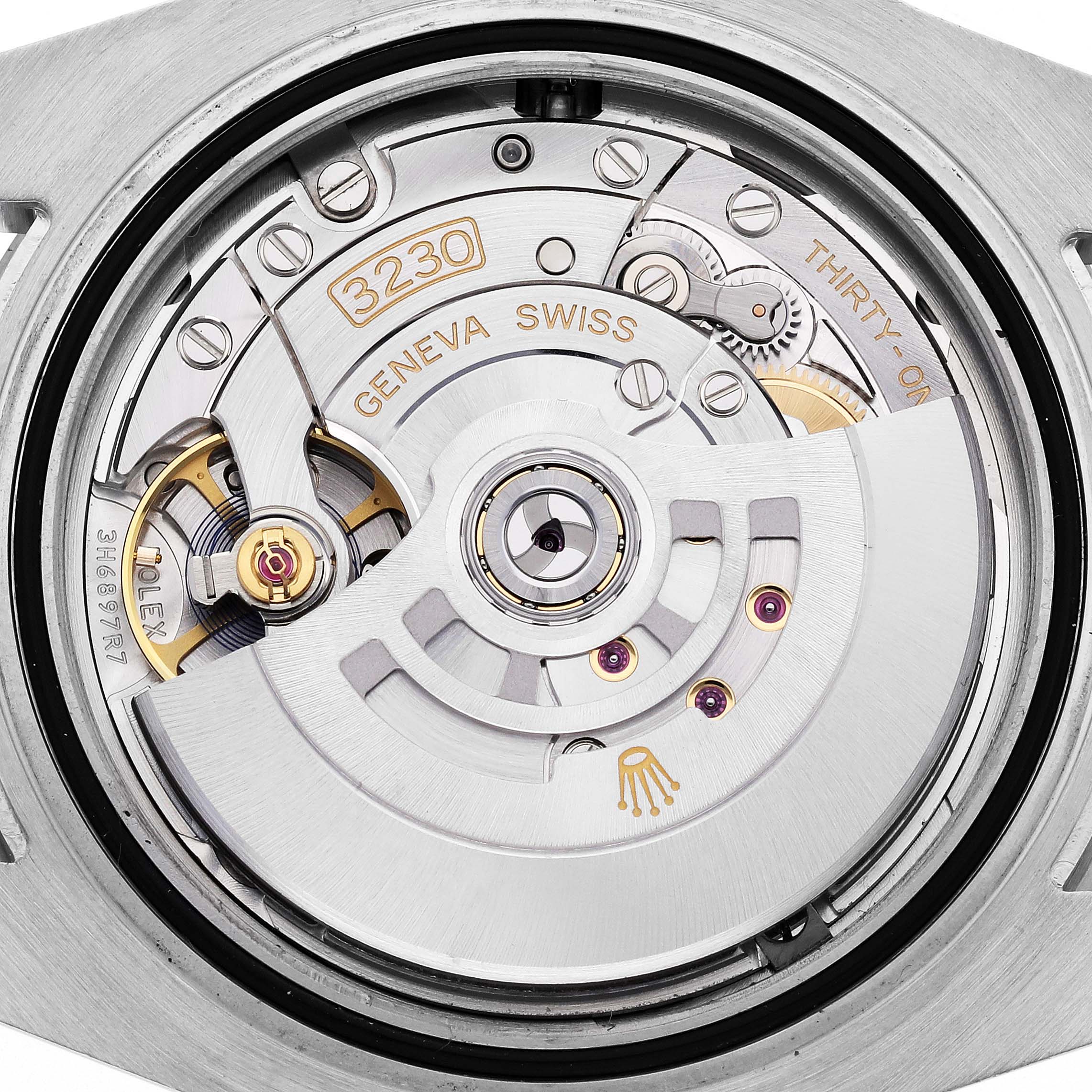 The image shows the back view of the Rolex Submariner 124060 Men's Stainless Steel Black Dial 124060 Men's Stainless Steel Black Dial, highlighting its movement and intricate mechanics.