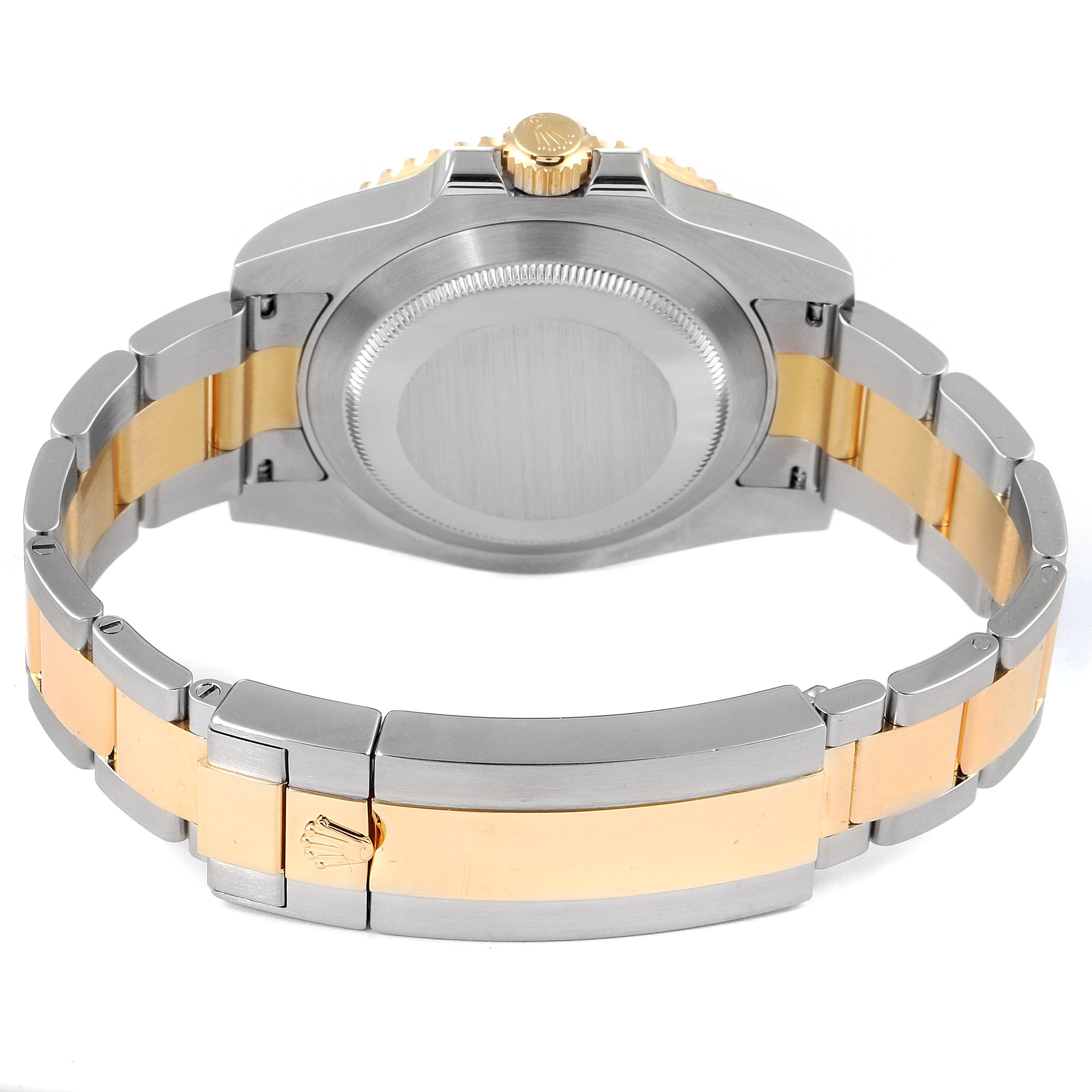 The image shows the back case and bracelet of a Rolex Submariner 116613 Men's Steel and Gold (two tone) Black Dial 116613 Men's Steel and Gold (two tone) Black Dial watch, highlighting its two-tone metal design.