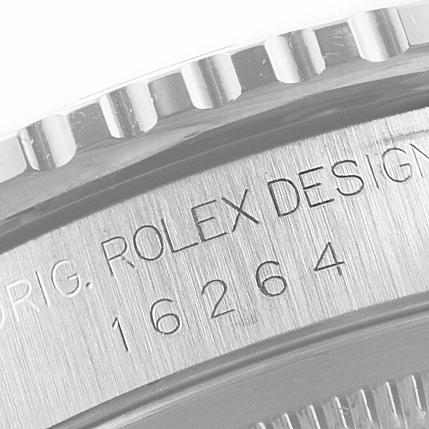 This close-up image of the Rolex Turn-o-Graph 16264 Men
s Stainless Steel Silver Dial 16264 Men
s Stainless Steel Silver Dial model shows the side of the watch case, featuring its design engraving and serial number.