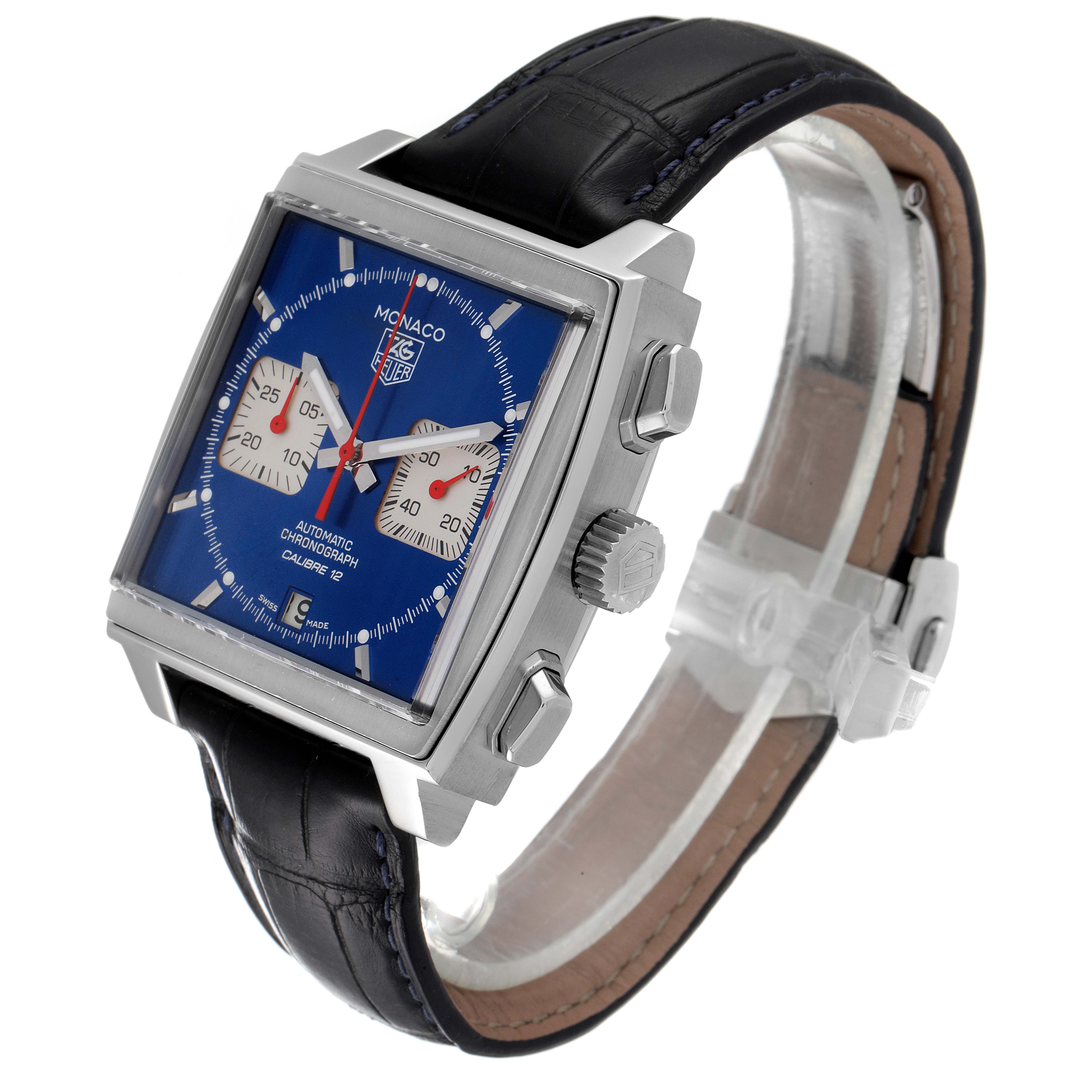 The image shows a side-angle view of the Tag Heuer Monaco CAW2111 Men's Stainless Steel Blue Dial CAW2111 Men's Stainless Steel Blue Dial watch, highlighting its blue square dial, chronograph subdials, and black leather strap.