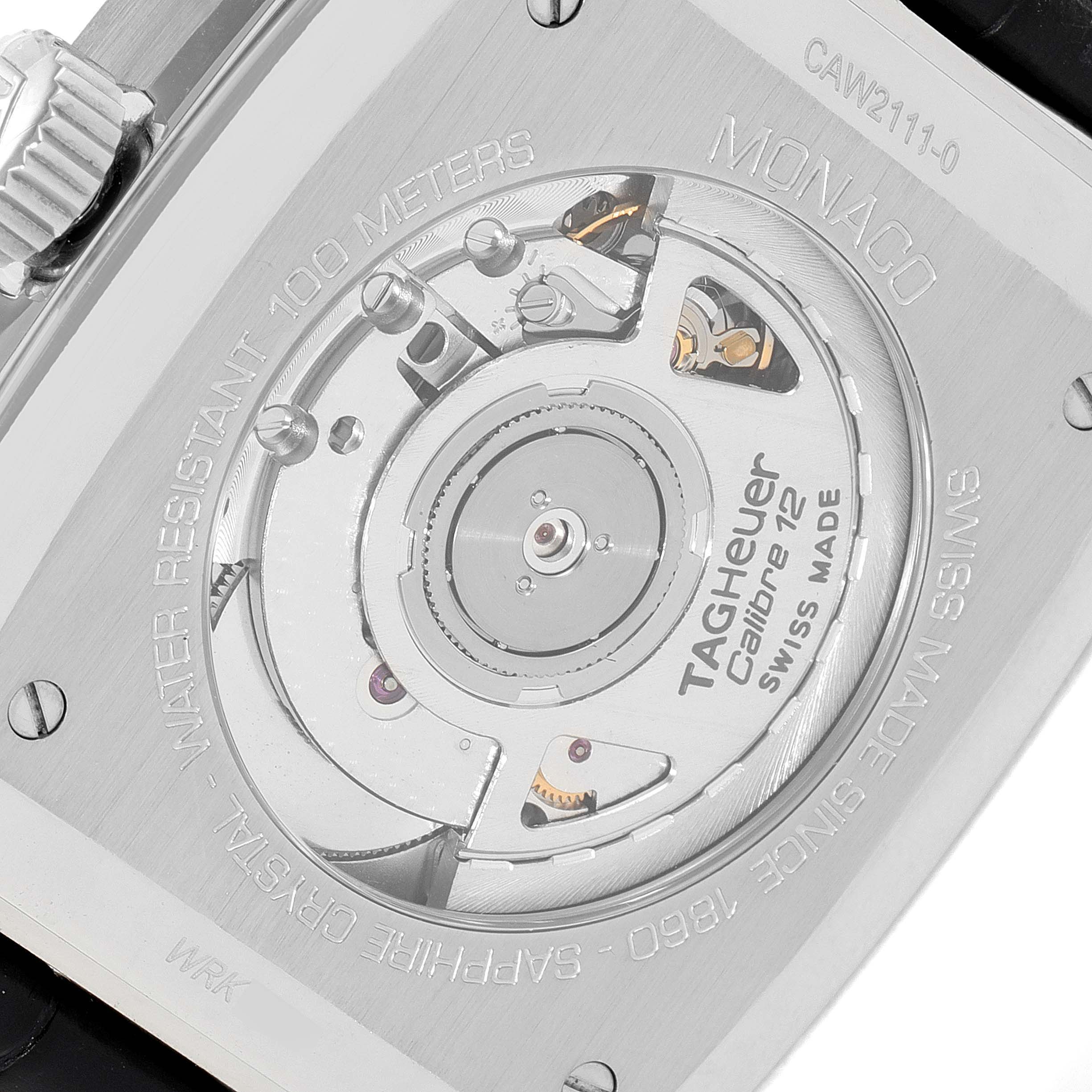 The image shows the back casing and movement mechanism of the Tag Heuer Monaco CAW2111 Men's Stainless Steel Blue Dial CAW2111 Men's Stainless Steel Blue Dial watch, including the Calibre 12.