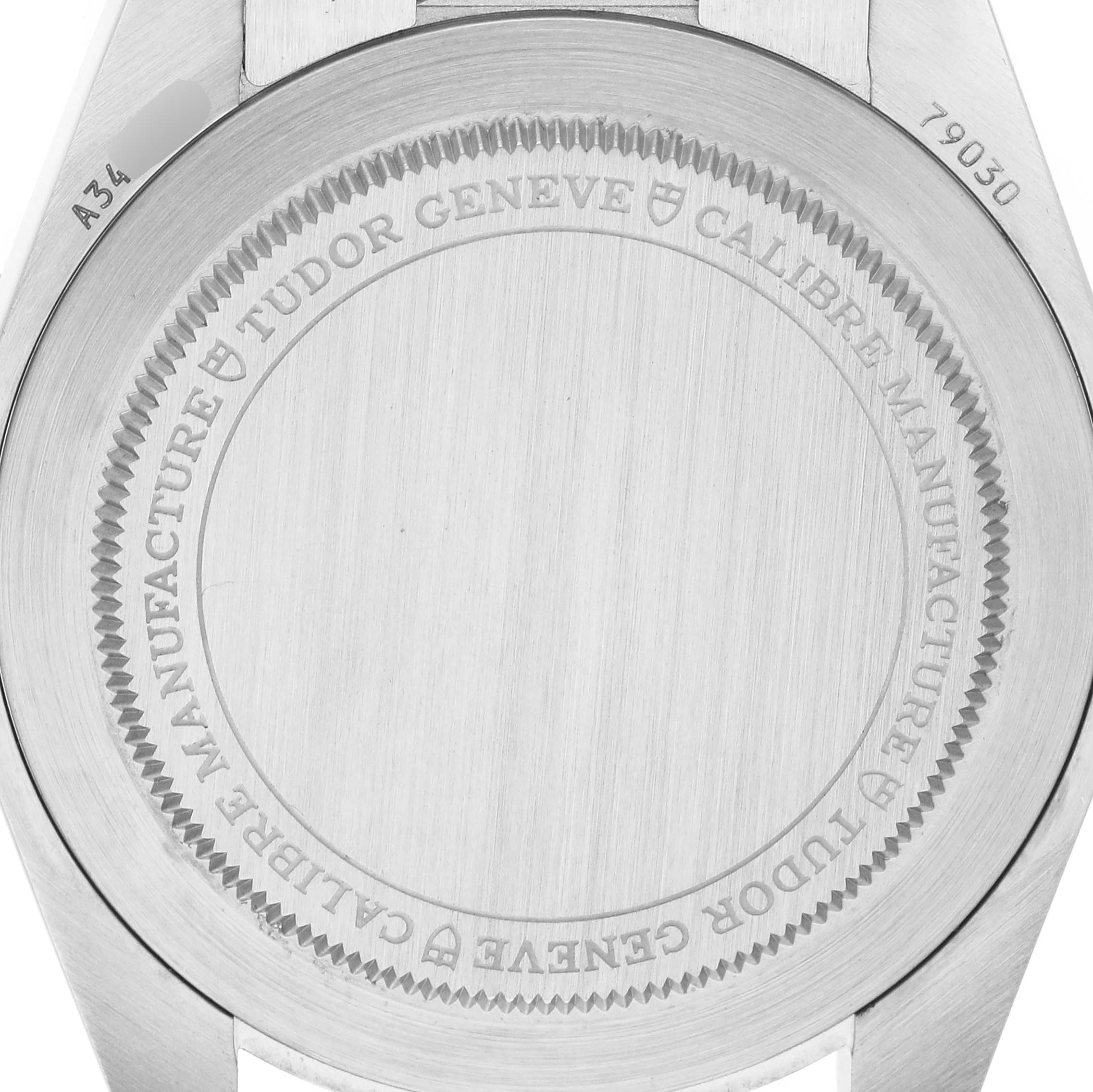 The image shows the engraved case back of the Tudor Heritage Black Bay 79030B Men's Stainless Steel Blue Dial watch viewed from the rear angle.