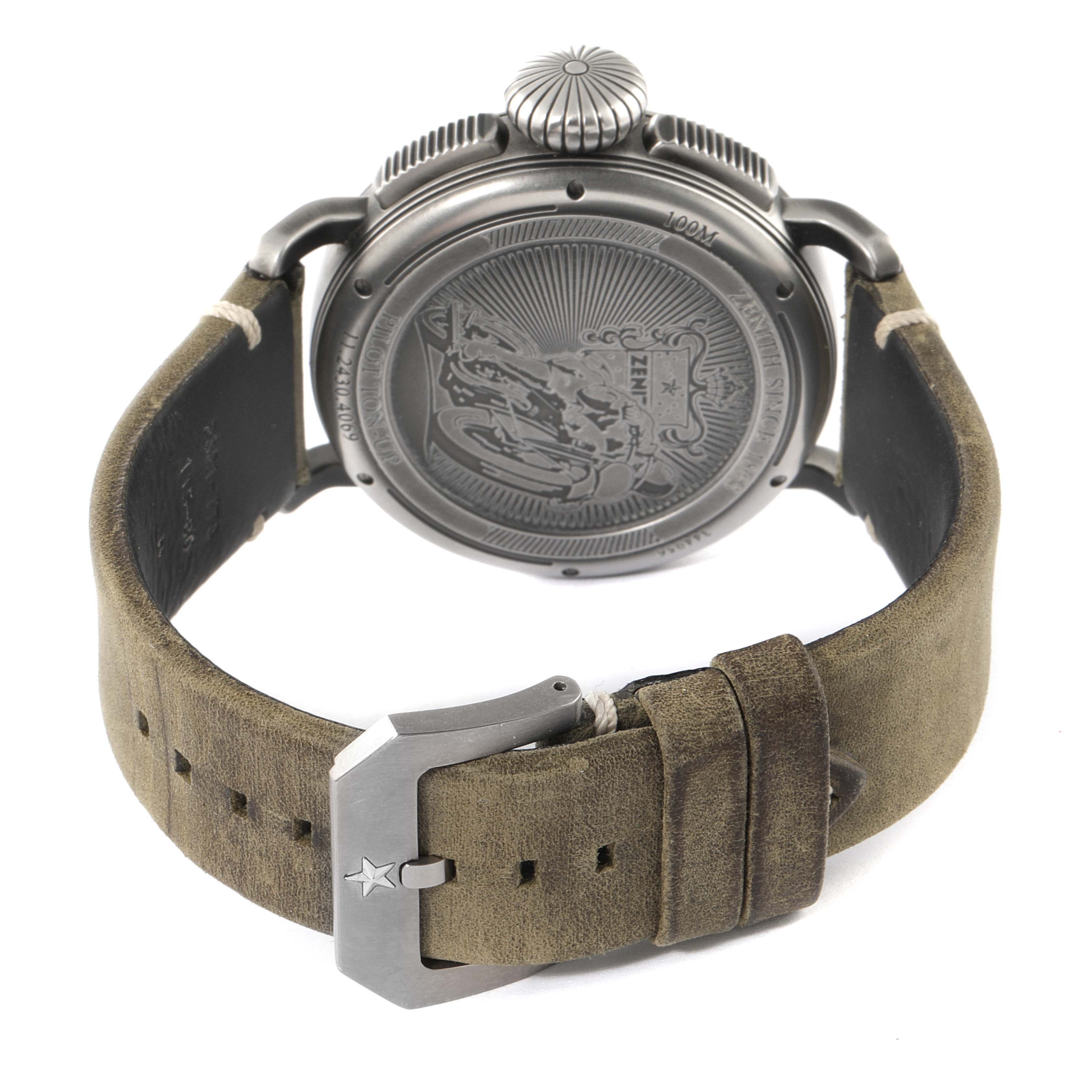 The image shows the back view of a Zenith Pilot 11.2430.4069/21.C773 Men's Stainless Steel Grey Dial 11.2430.4069/21.C773 Men's Stainless Steel Grey Dial watch, detailing its case back, crown, and leather strap with buckle.