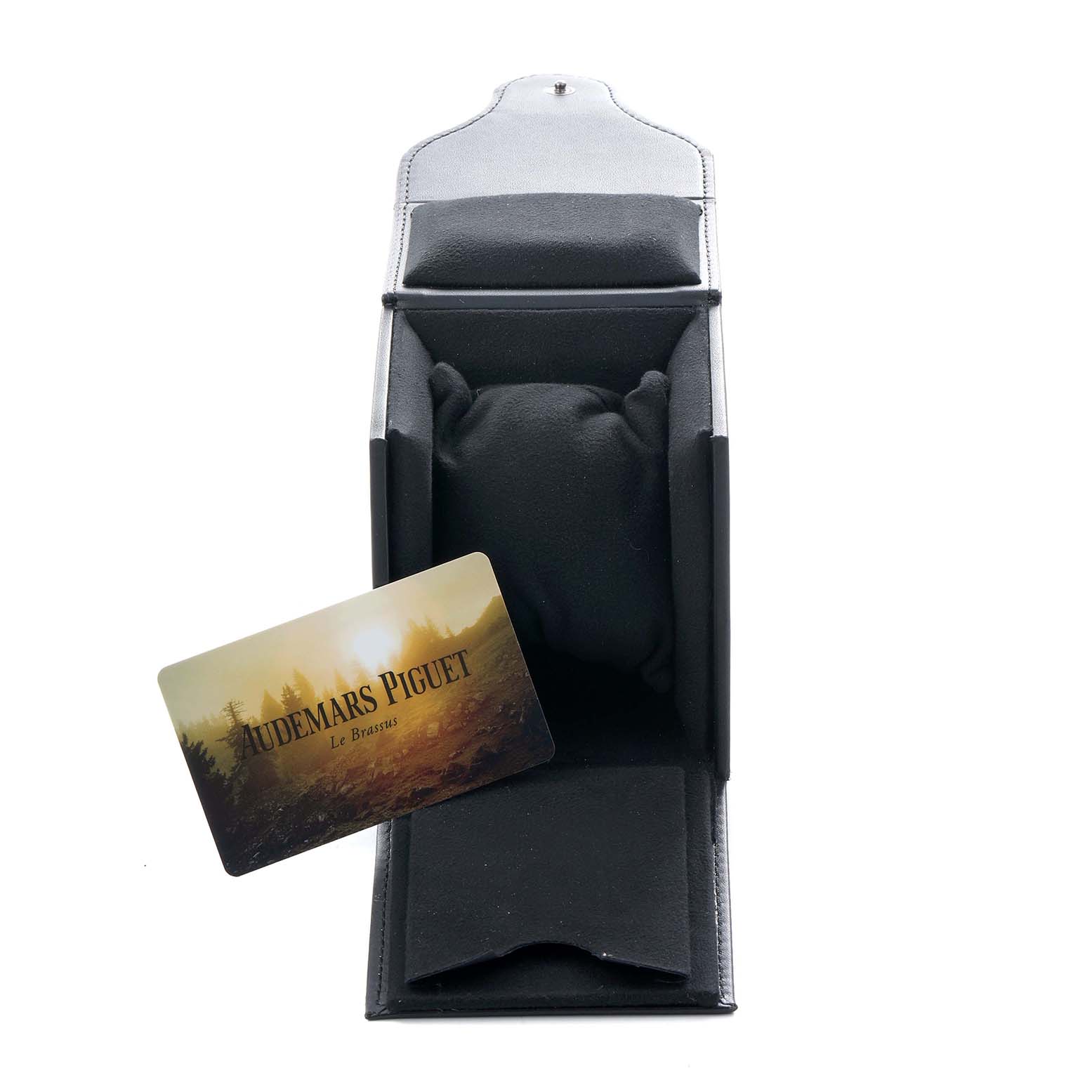 The image shows an Audemars Piguet Royal Oak 56175TT Men's Stainless Steel Grey Dial watch box and cushion at a top angle, with a branded card visible.