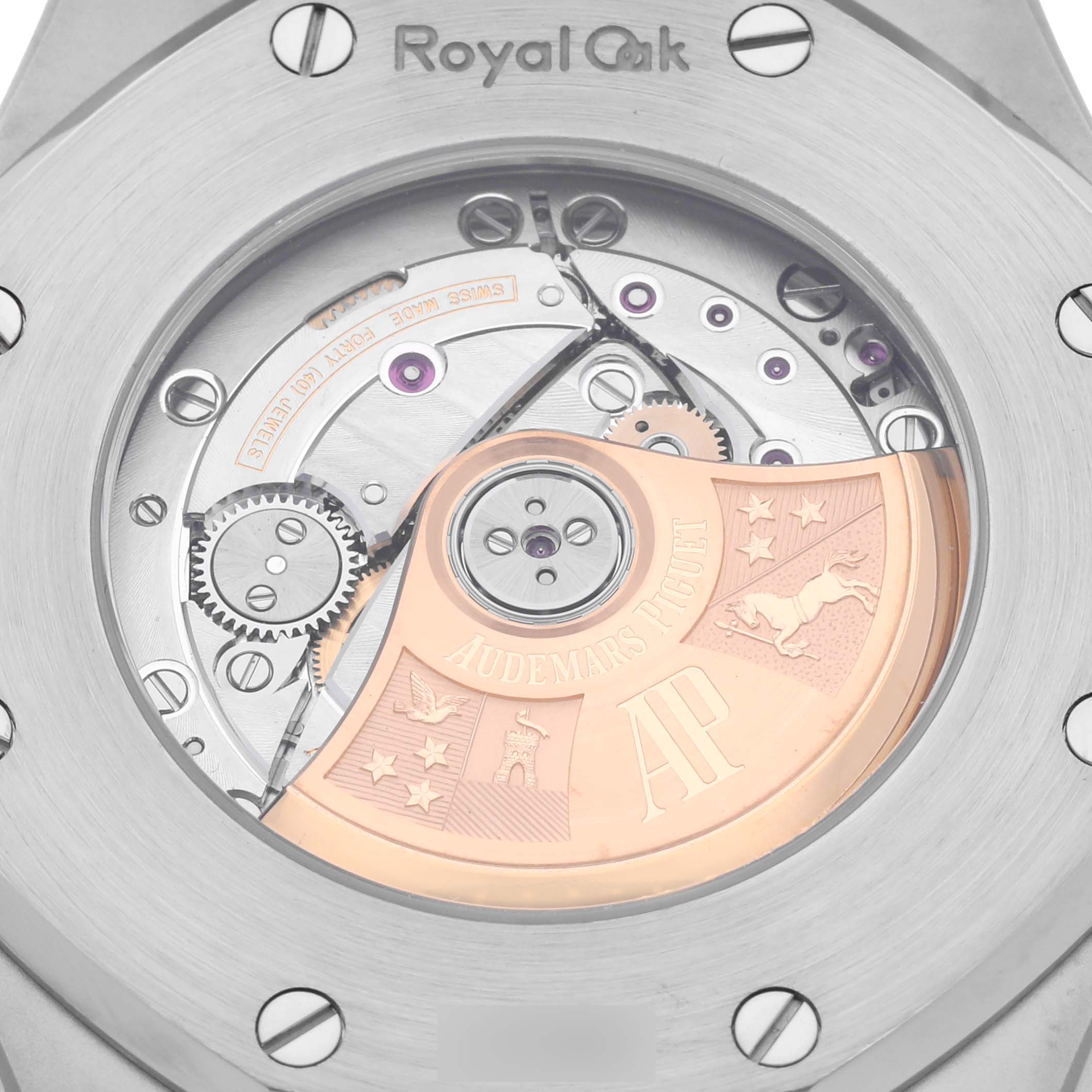The image shows the back of an Audemars Piguet Royal Oak 15400ST.OO.1220ST.02.A Men's Stainless Steel Silver Dial 15400ST.OO.1220ST.02.A Men's Stainless Steel Silver Dial watch, highlighting its intricate movement and rotor.