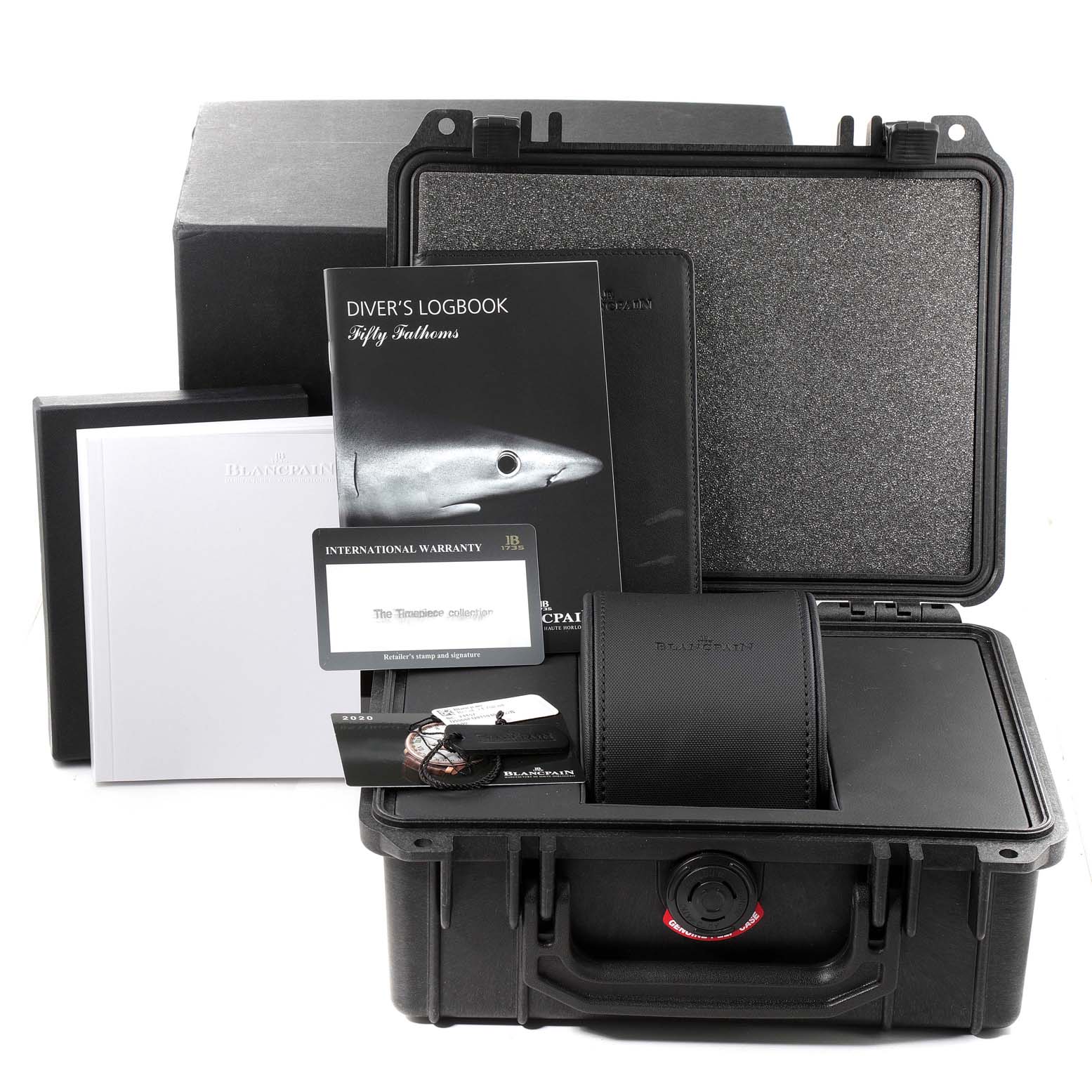 The image shows the Blancpain Fifty Fathoms 5066F-1140-52B Men's Stainless Steel Blue Dial 5066F-1140-52B Men's Stainless Steel Blue Dial watch packaging, including a diver's logbook, warranty card, and a black protective case.