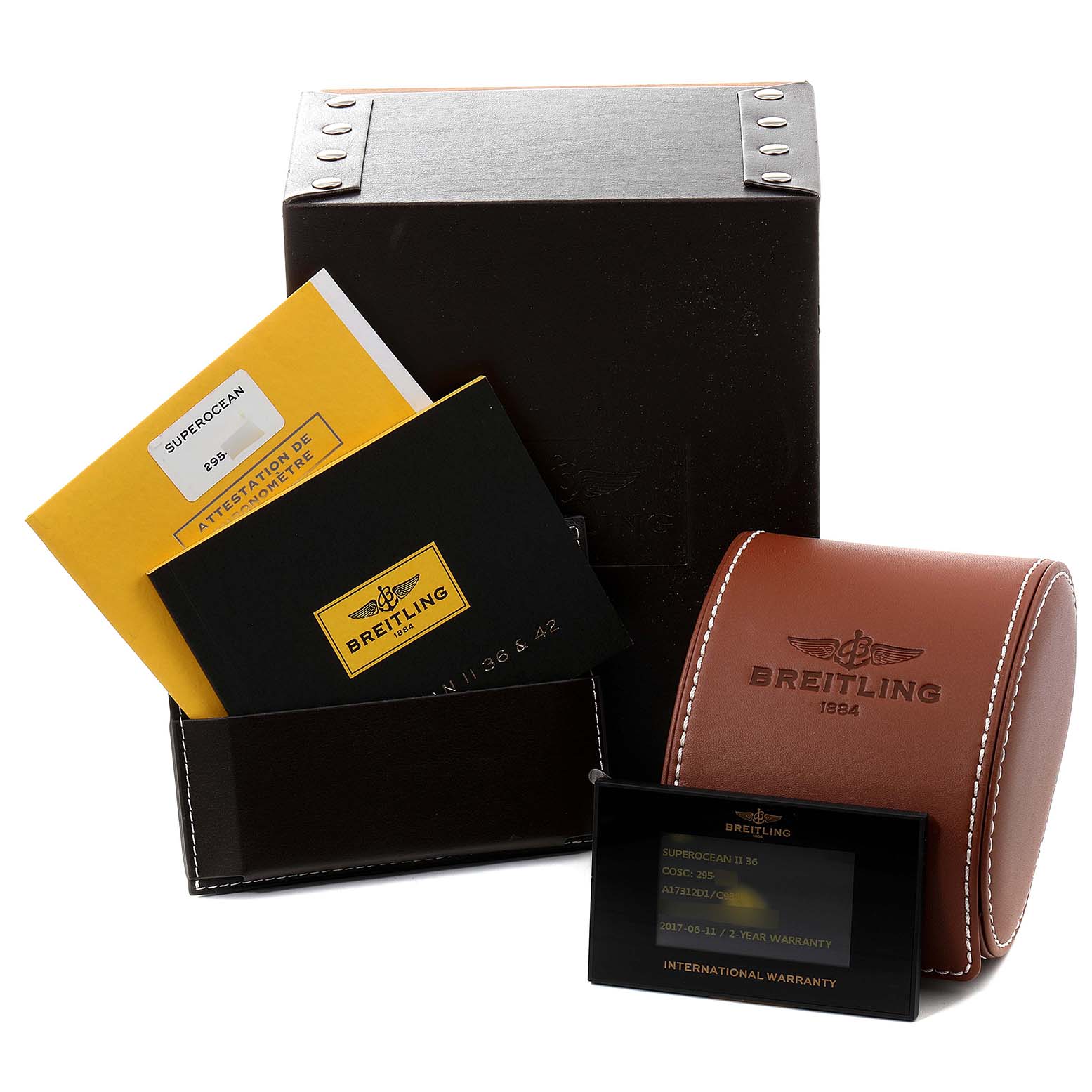 The image shows the box, papers, and leather case for the Breitling A17312 Women's Stainless Steel Blue Dial A17312 Women's Stainless Steel Blue Dial Superocean II 36 Hurricane Steel Ladies Watch A17312.