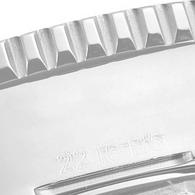 This close-up image shows part of the bezel and case back of the Breitling A17312 Women's Stainless Steel Blue Dial A17312 Women's Stainless Steel Blue Dial Superocean II 36 Hurricane Steel Ladies Watch A17312.