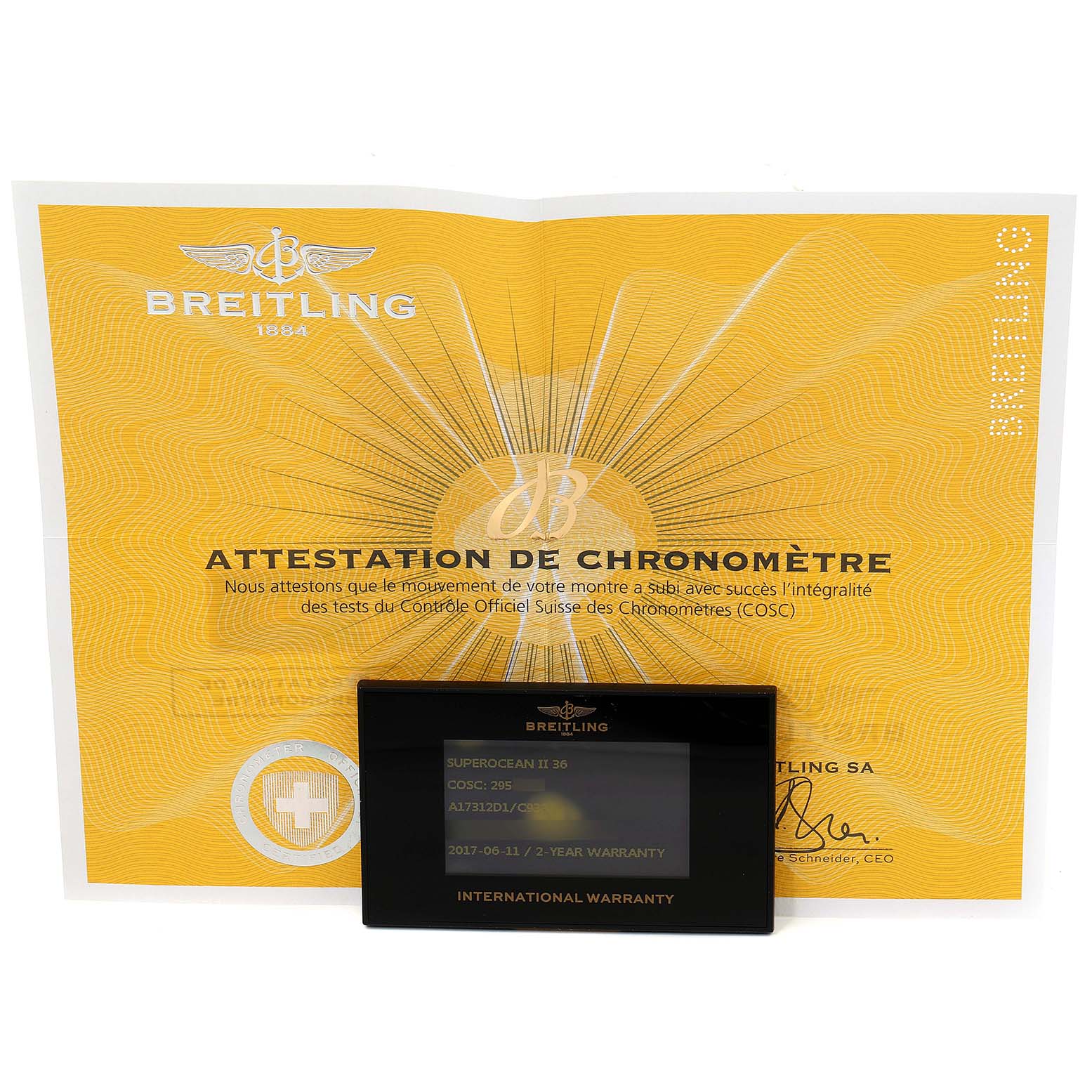 The image shows the warranty documents and certification for the Breitling A17312 Women's Stainless Steel Blue Dial A17312 Women's Stainless Steel Blue Dial Superocean II 36 Hurricane Steel Ladies Watch A17312 model.