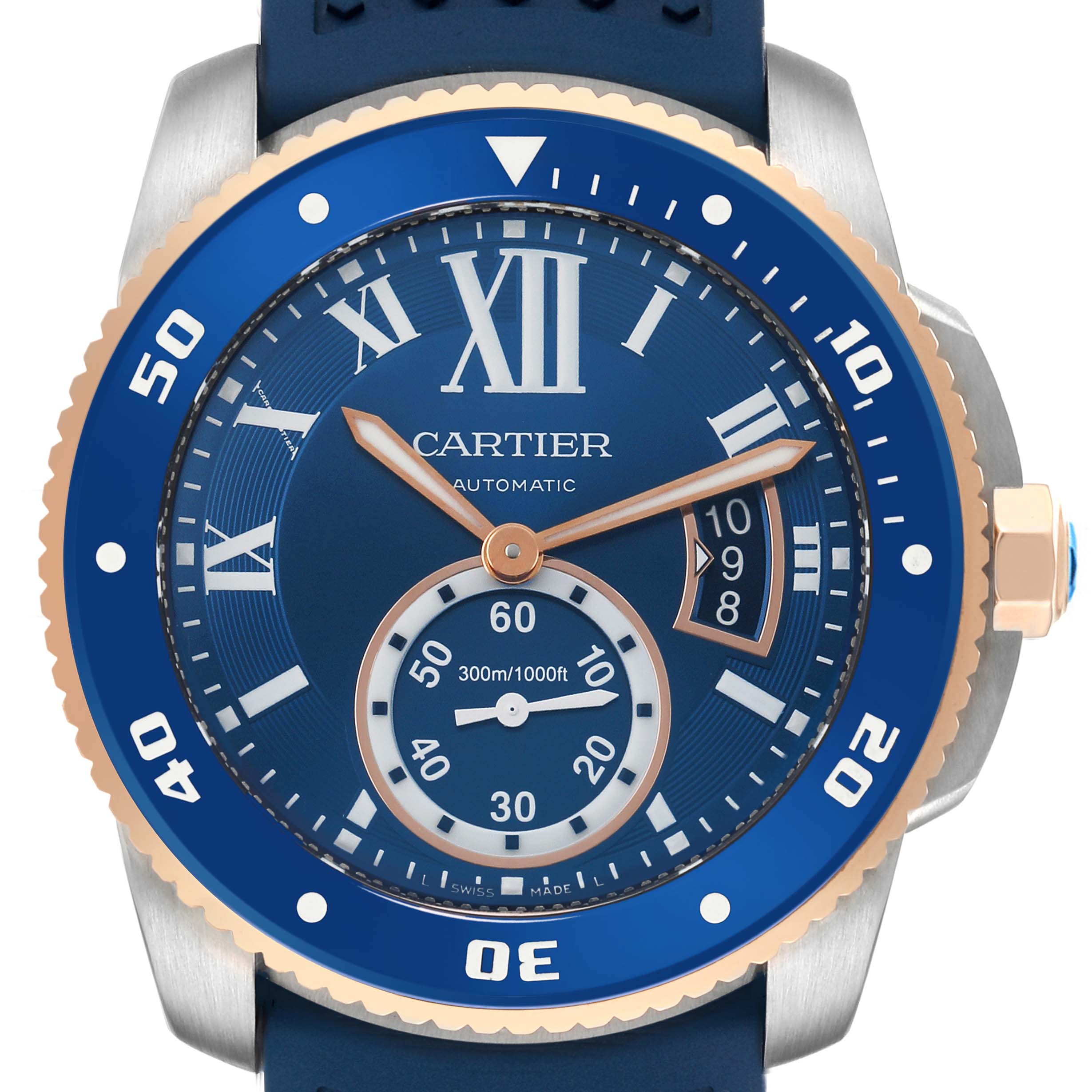 The image shows a close-up front view of the Calibre de Cartier watch, highlighting its blue dial, Roman numerals, and bezel.