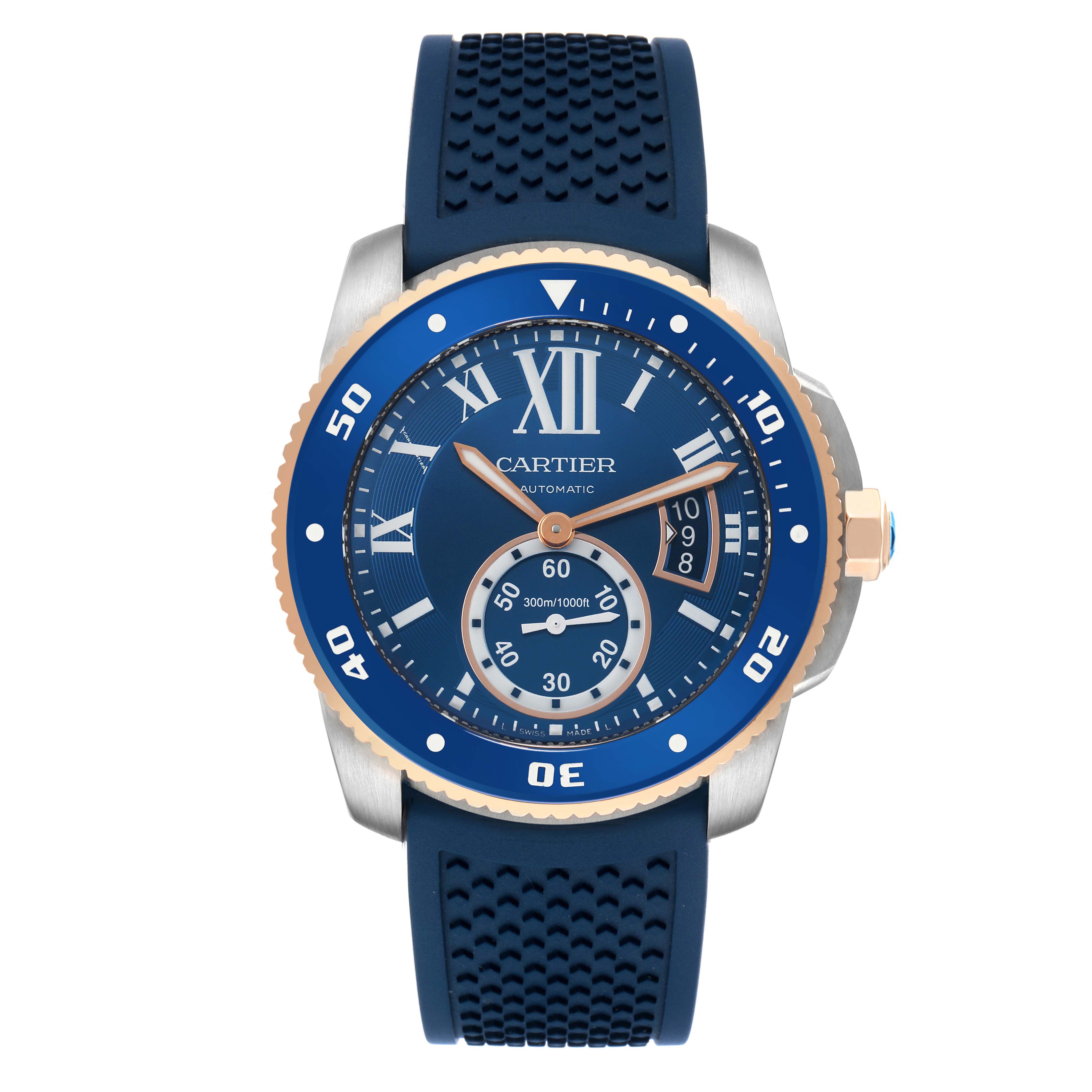 The Calibre de Cartier watch is shown from a front view, highlighting the blue dial, bezel, and strap.