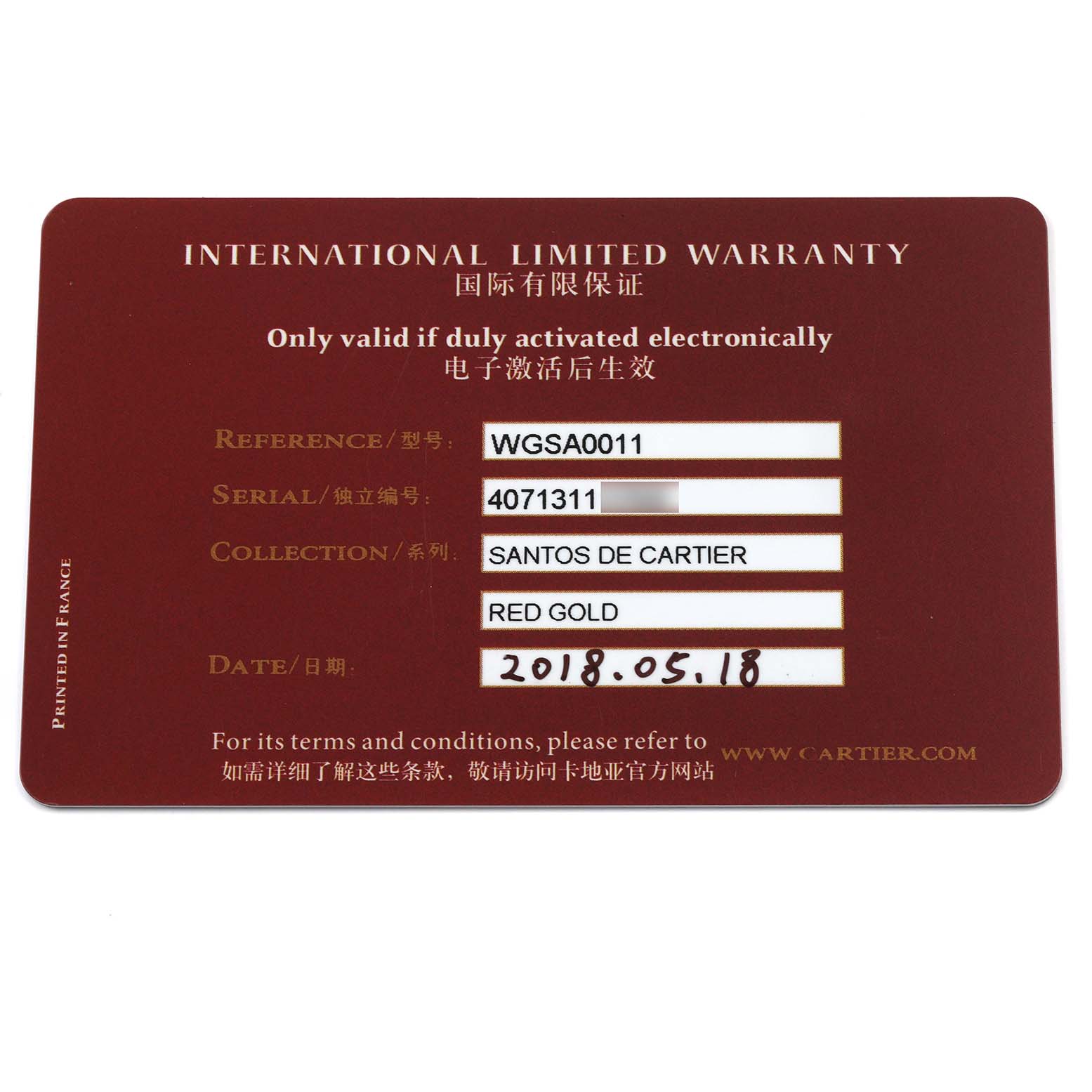 The image shows the International Limited Warranty card for the Santos de Cartier watch model.