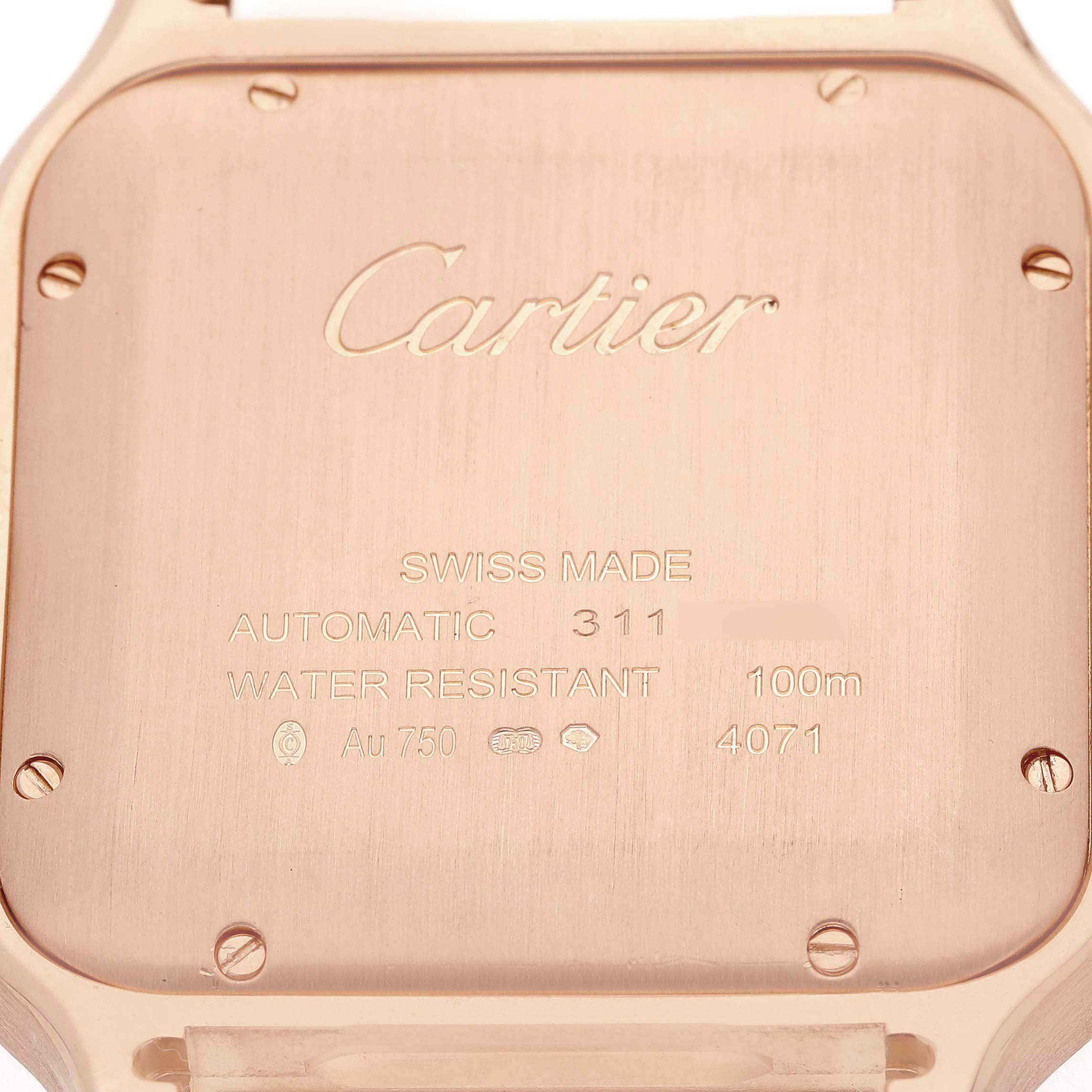 The image shows the back case of a Cartier Santos WGSA0011 Men's Rose Gold Silver Dial watch featuring engraved details like "Swiss Made" and "Water Resistant."