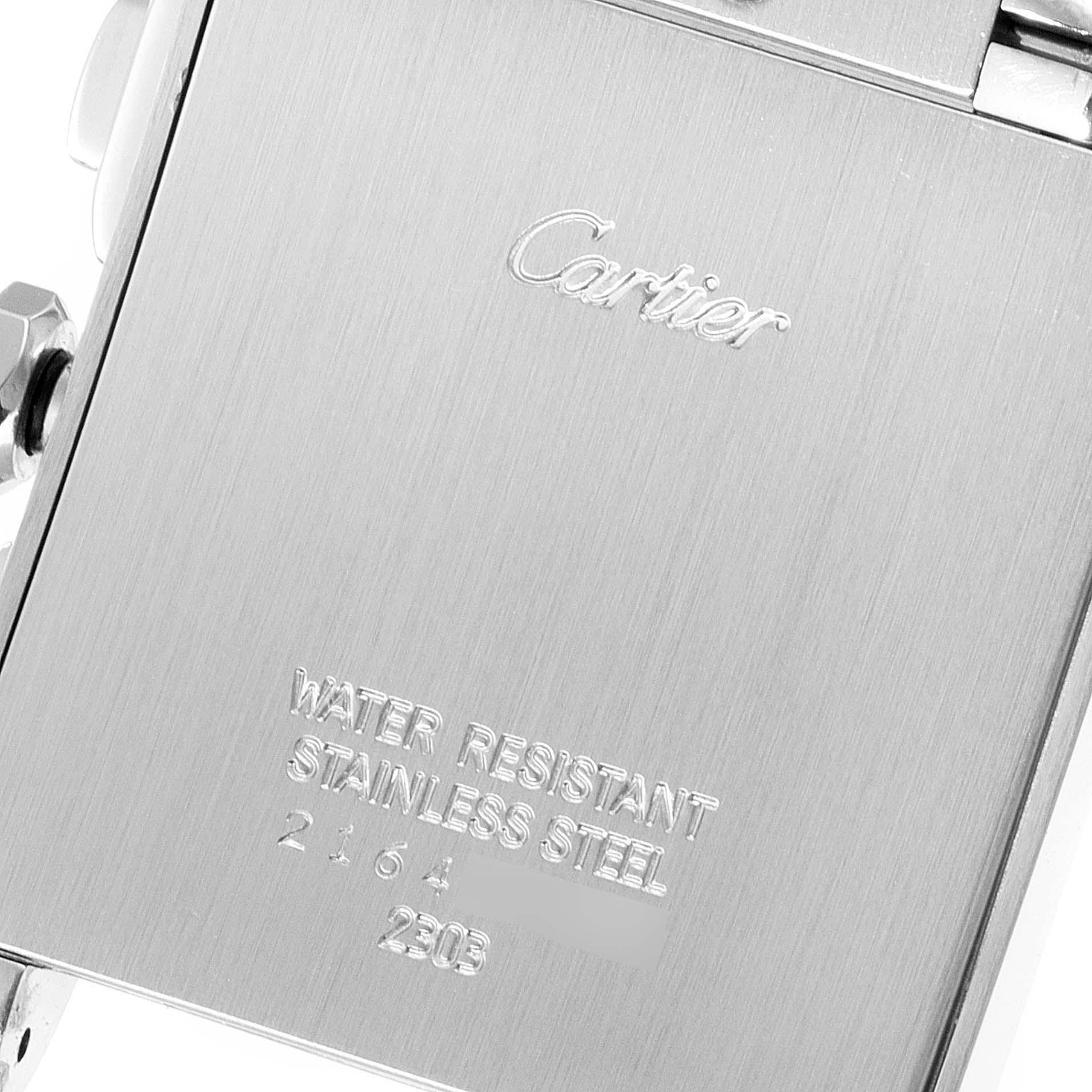 This image shows the engraved backside of a Cartier Tank Francaise W51001Q3 Men's Stainless Steel Silver Dial W51001Q3 Men's Stainless Steel Silver Dial watch in stainless steel.