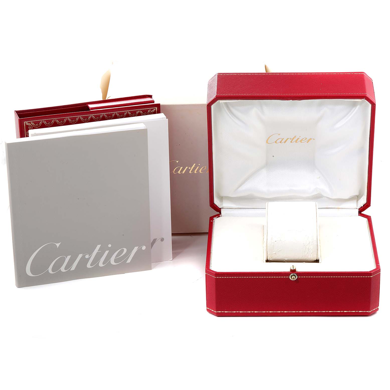 The image shows a Cartier Tank Francaise W51001Q3 Men's Stainless Steel Silver Dial W51001Q3 Men's Stainless Steel Silver Dial's red watch box, instruction manuals, and packaging components.