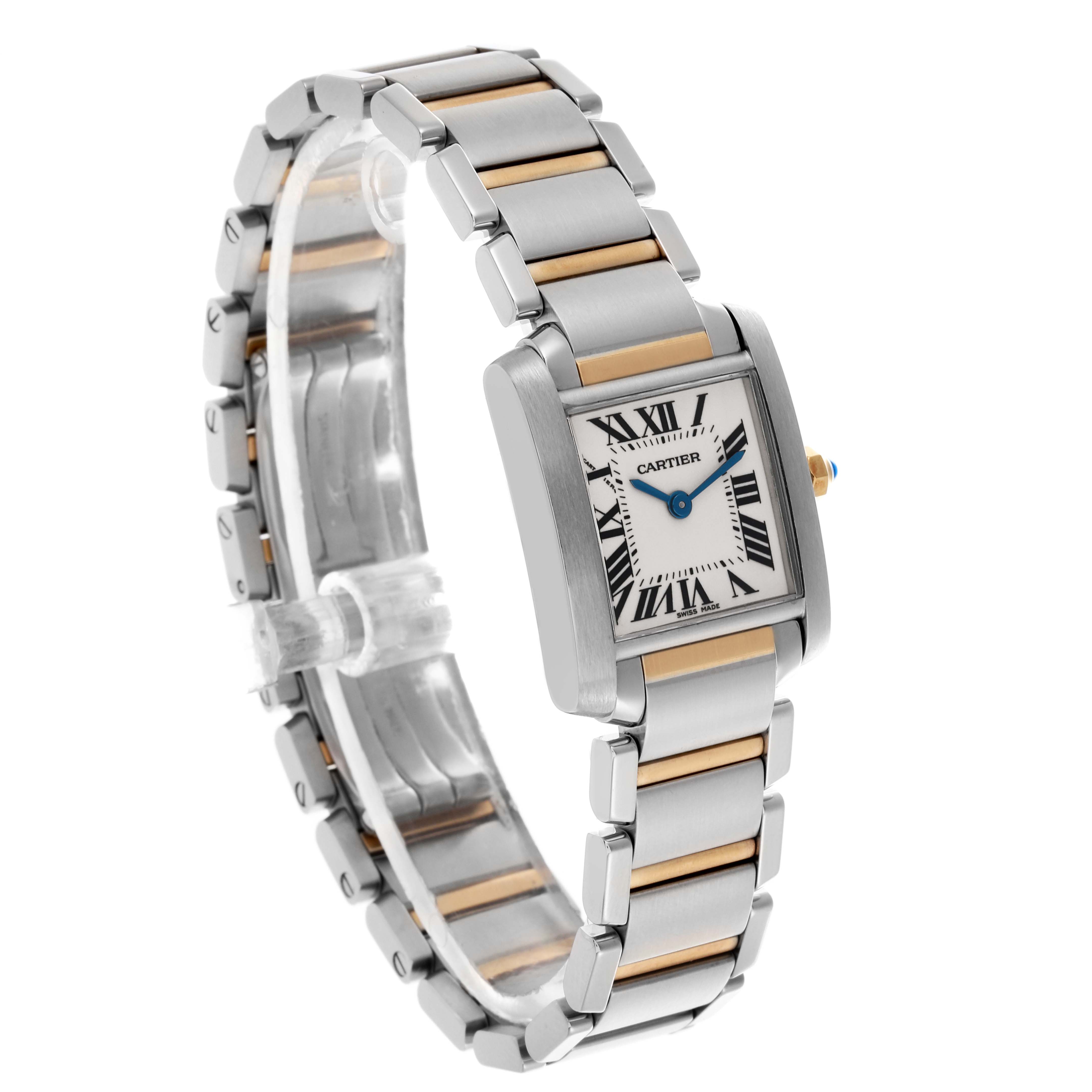 The Cartier Tank Française watch is shown at a slight angle, highlighting the rectangular face and two-tone metal bracelet.
