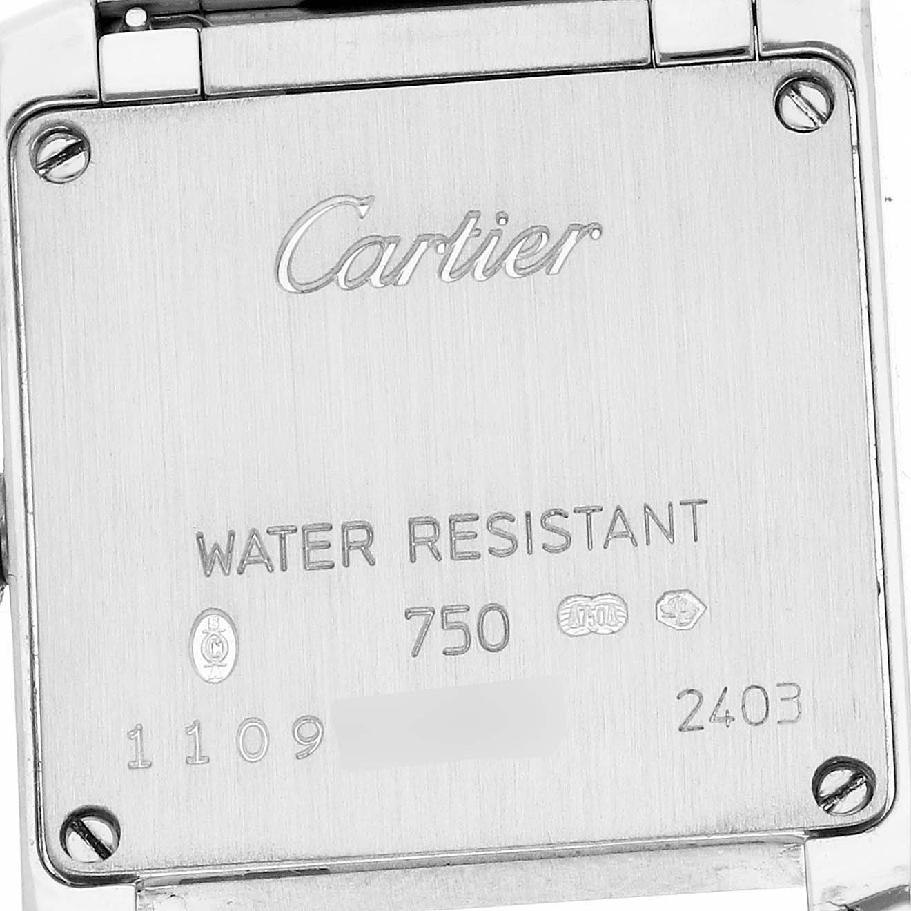 The image shows the back casing of a Cartier Tank Française watch, featuring engravings and water resistance information.