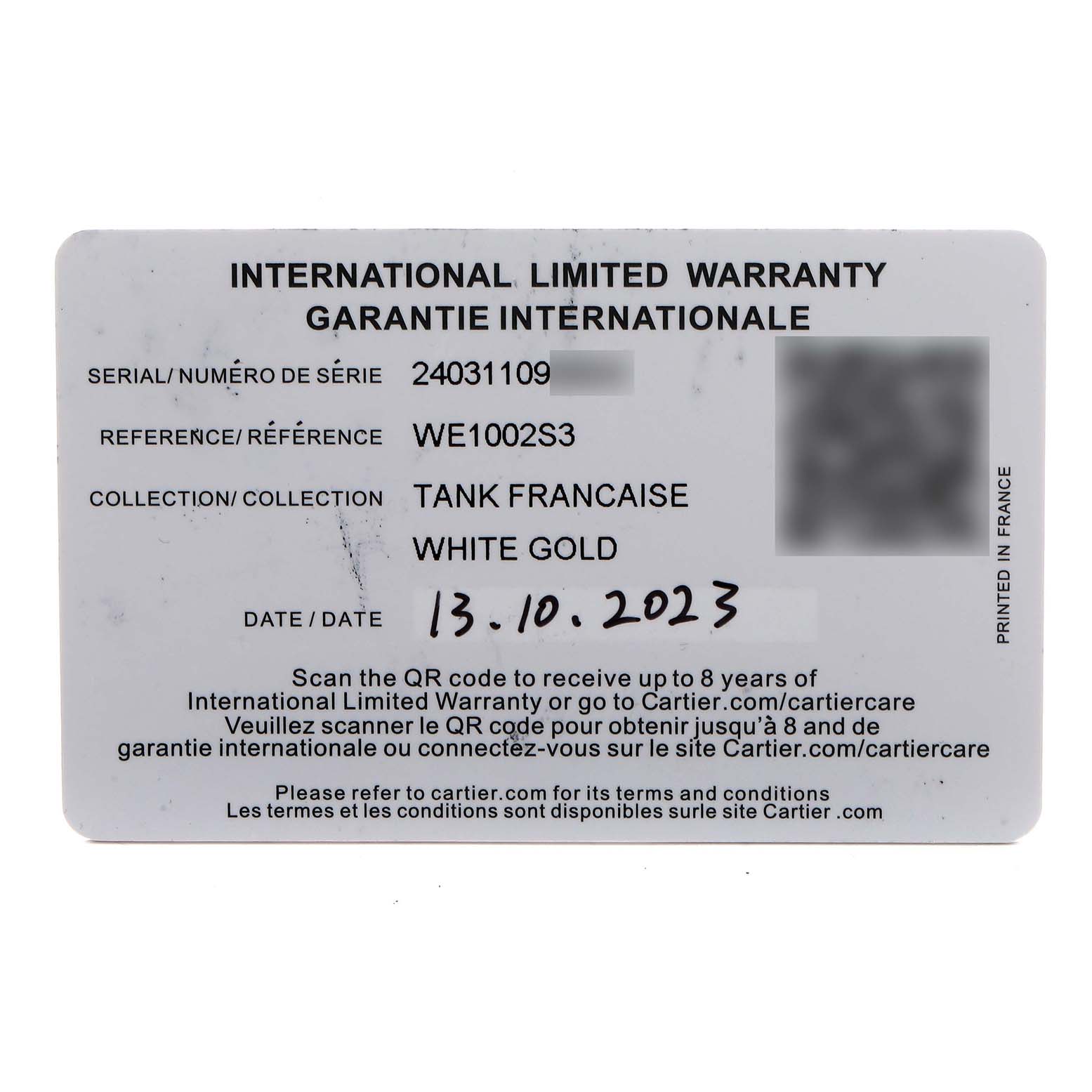 The image shows the warranty card for the Cartier Tank Française watch model in white gold.