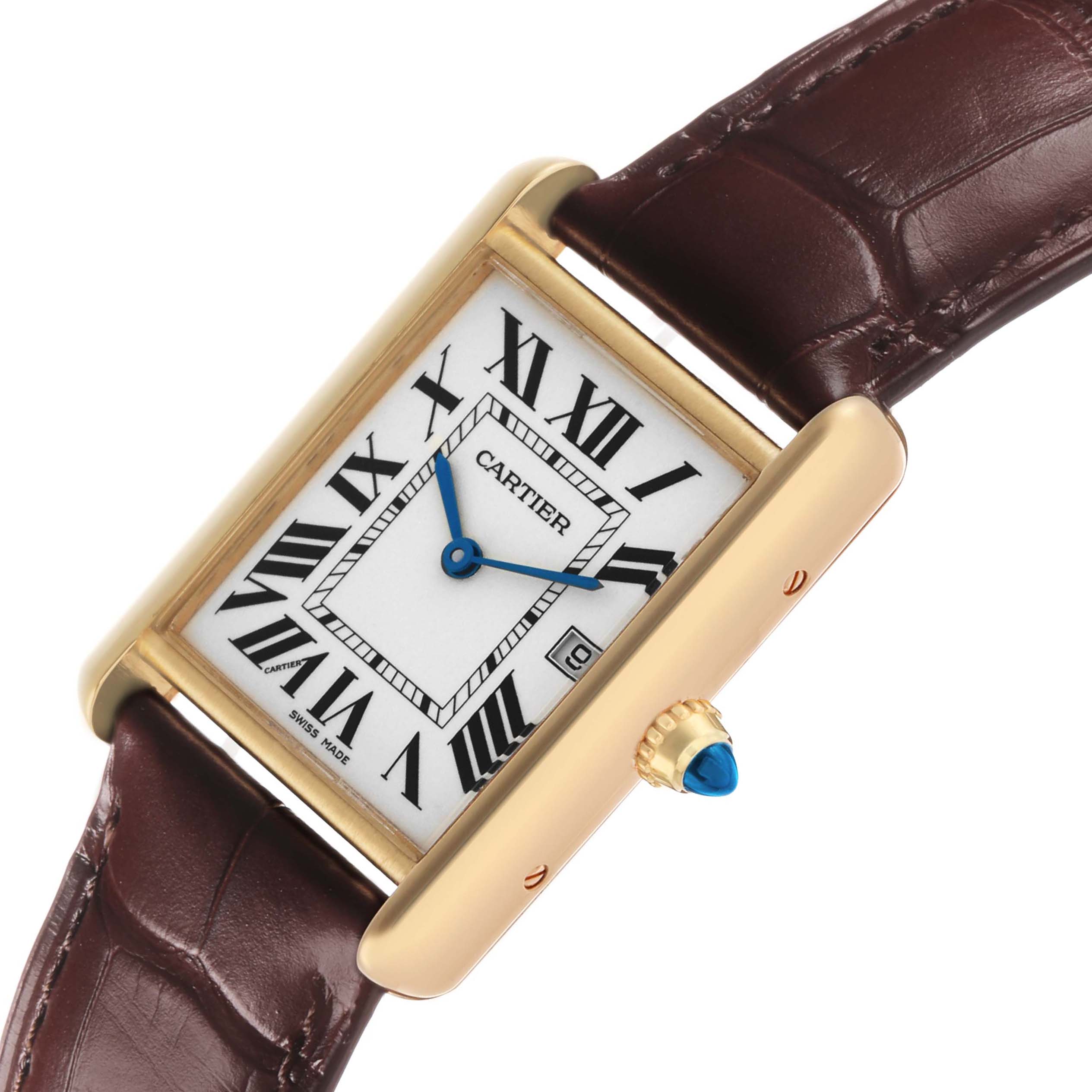 The Cartier Tank Louis W1529756 Men's Yellow Gold Silver Dial watch is shown at an angle highlighting its gold case, white dial with Roman numerals, and brown leather strap.