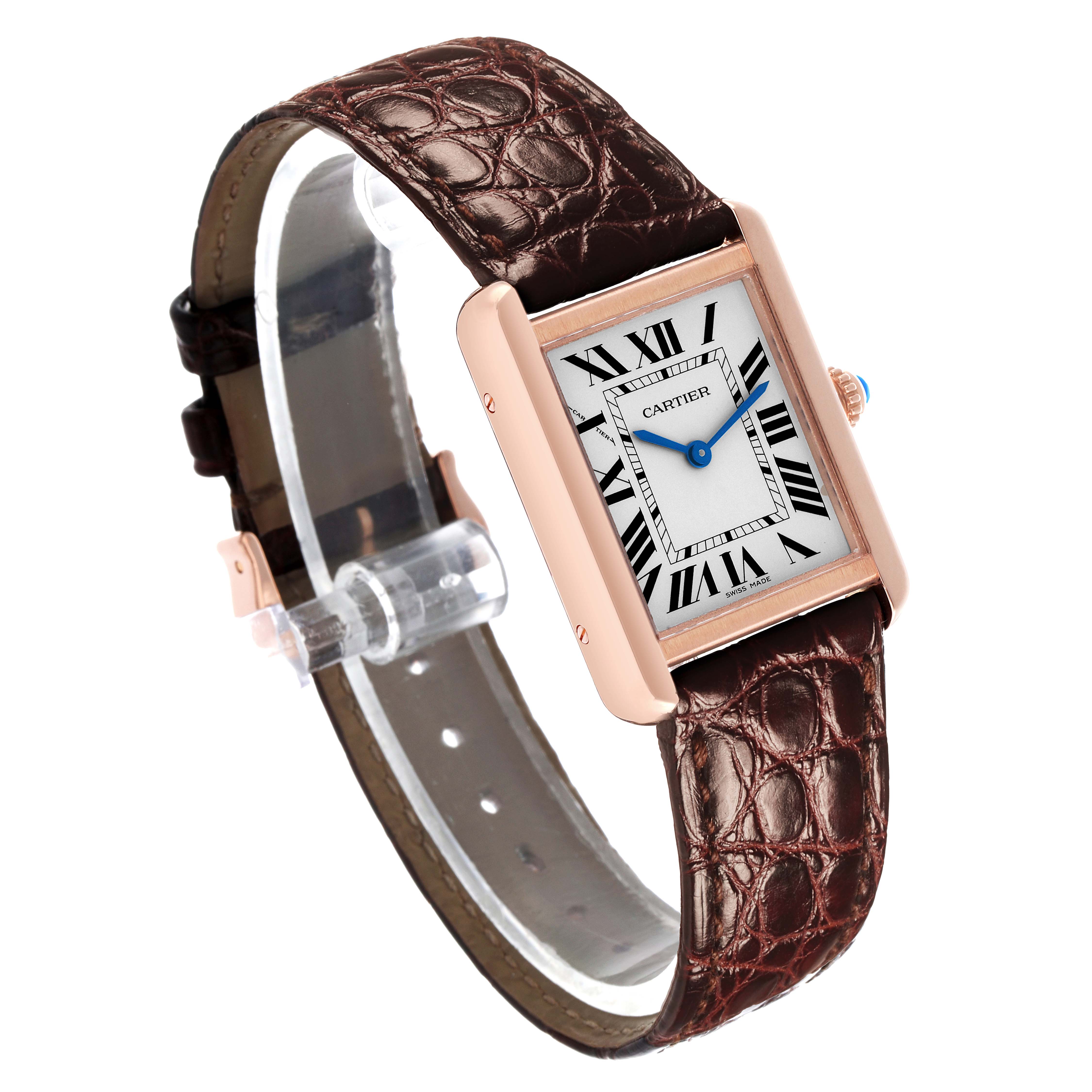 The Cartier Tank Solo W5200024 Women's Rose Gold Silver Dial watch is shown at an angled side view, highlighting its rectangular face and leather strap.