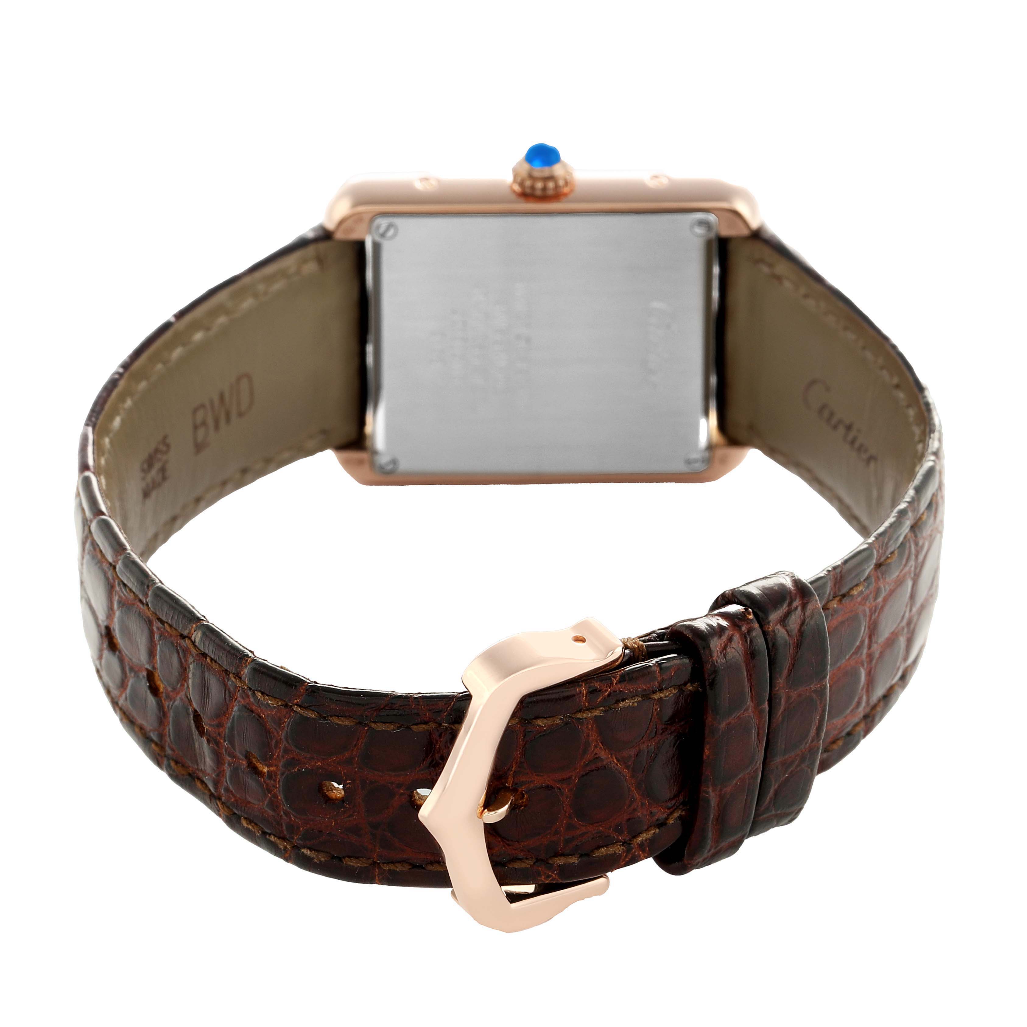 The image shows the back of the Cartier Tank Solo W5200024 Women's Rose Gold Silver Dial watch with its strap and buckle visible at an angled view.