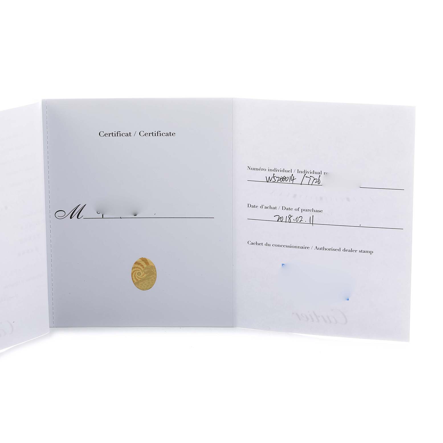 The image shows the certificate and documents for the Cartier Tank Solo W5200014 Men's Stainless Steel Silver Dial watch.