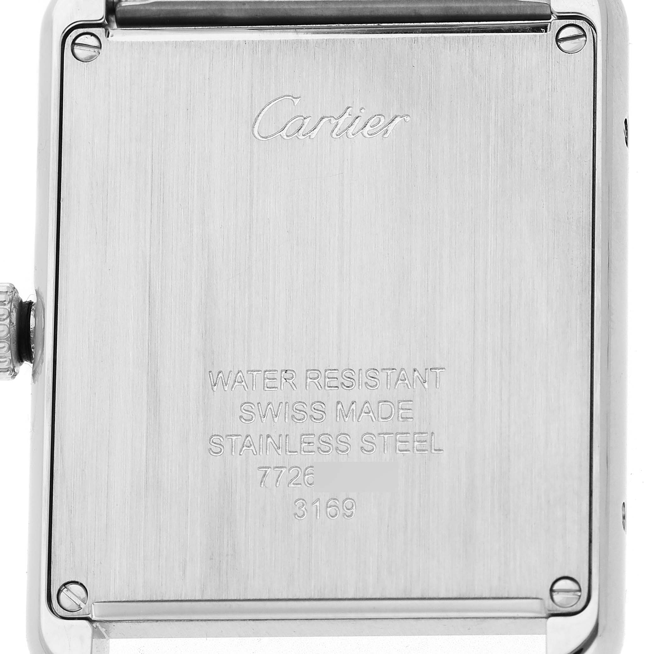 The image shows the back case of a Cartier Tank Solo W5200014 Men's Stainless Steel Silver Dial watch, displaying engraved details and text.